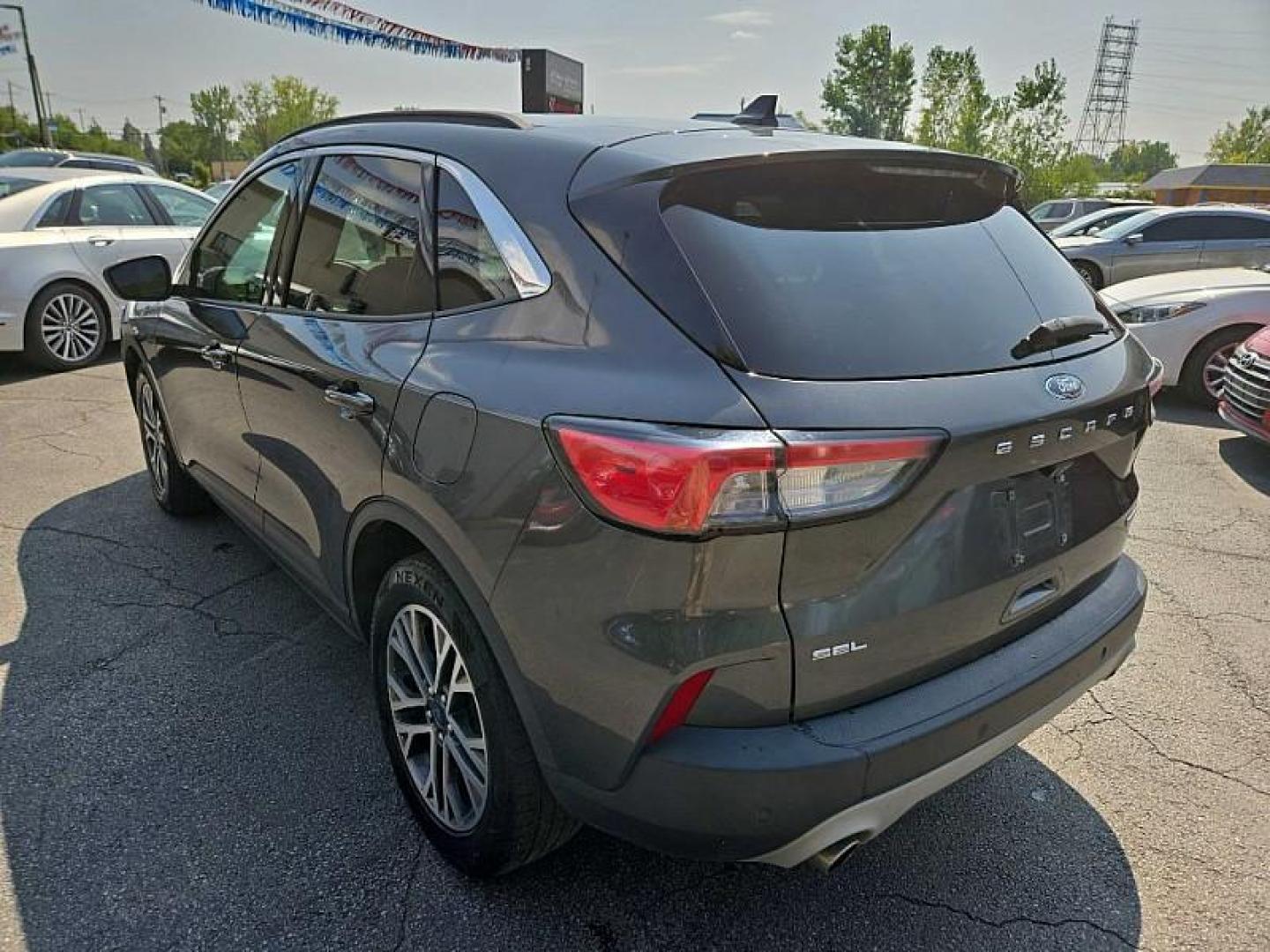 2020 GRAY /BLACK Ford Escape SEL (1FMCU0H69LU) with an 1.5L L3 engine, 6A transmission, located at 3304 Woodville Road, Northwood, OH, 43619, (419) 210-8019, 41.612694, -83.480743 - We are #1 Auto Loan Dealer for Good Bad or No Credit we have hundreds of vehicles to choose from, stop on in or just fill out our online application to get approved for auto financing and see your credit score for free by visiting our website today. We have Low Payment Options and Terms Available - Photo#2