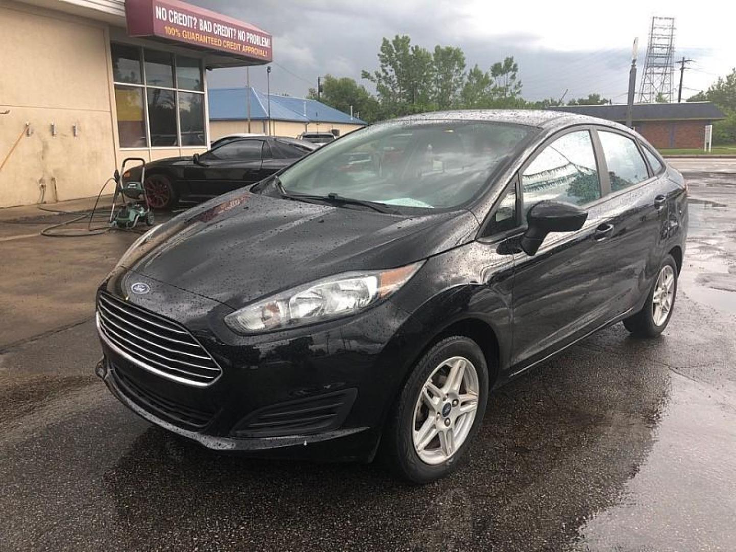 2019 BLACK /BLACK Ford Fiesta SE Sedan (3FADP4BJ4KM) with an 1.6L L4 DOHC 16V engine, Automatic transmission, located at 3304 Woodville Road, Northwood, OH, 43619, (419) 210-8019, 41.612694, -83.480743 - We are #1 Auto Loan Dealer for Good Bad or No Credit we have hundreds of vehicles to choose from, stop on in or just fill out our online application to get approved for auto financing and see your credit score for free by visiting our website today. We have Low Payment Options and Terms Available - Photo#0