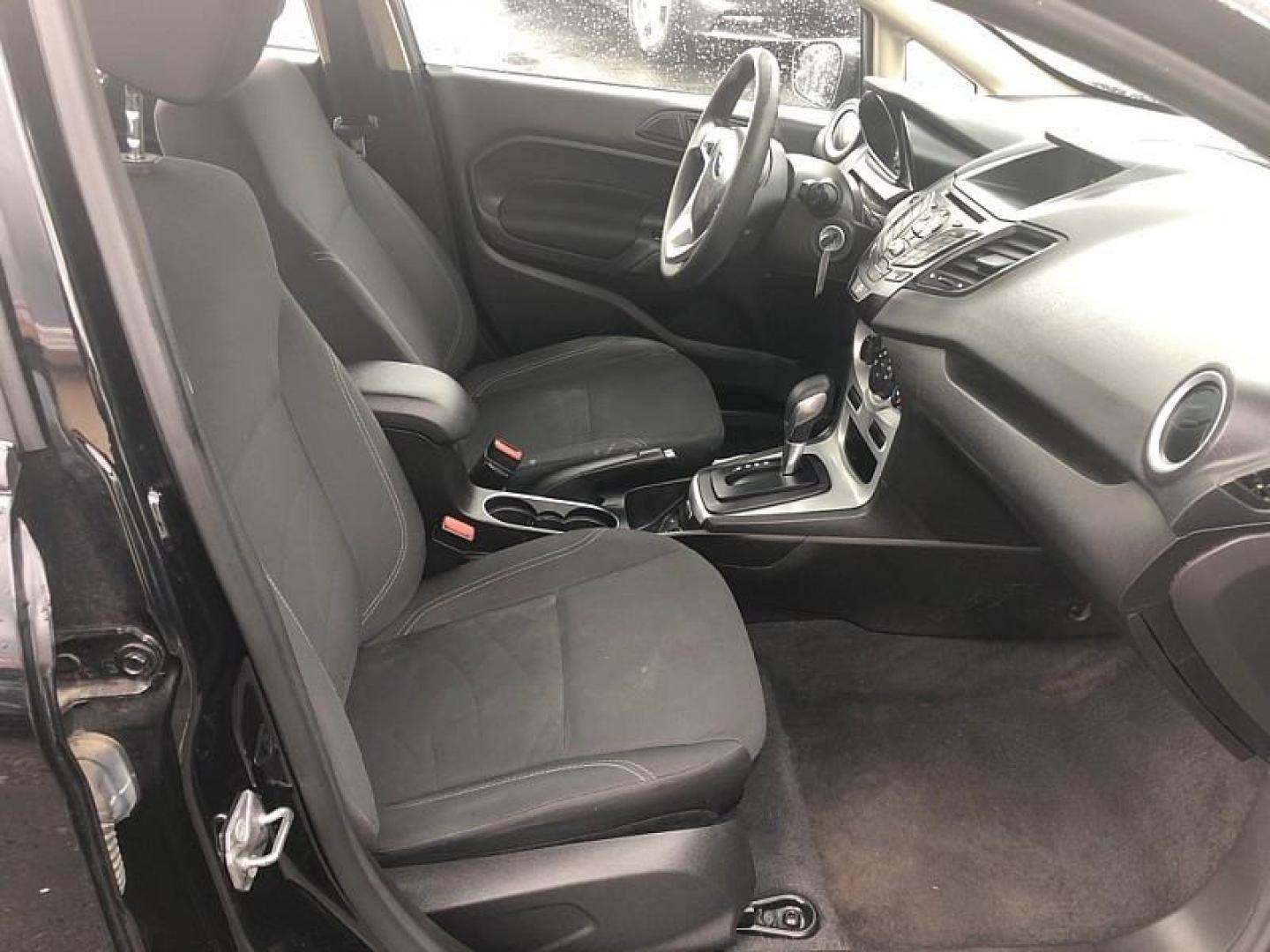 2019 BLACK /BLACK Ford Fiesta SE Sedan (3FADP4BJ4KM) with an 1.6L L4 DOHC 16V engine, Automatic transmission, located at 3304 Woodville Road, Northwood, OH, 43619, (419) 210-8019, 41.612694, -83.480743 - We are #1 Auto Loan Dealer for Good Bad or No Credit we have hundreds of vehicles to choose from, stop on in or just fill out our online application to get approved for auto financing and see your credit score for free by visiting our website today. We have Low Payment Options and Terms Available - Photo#16