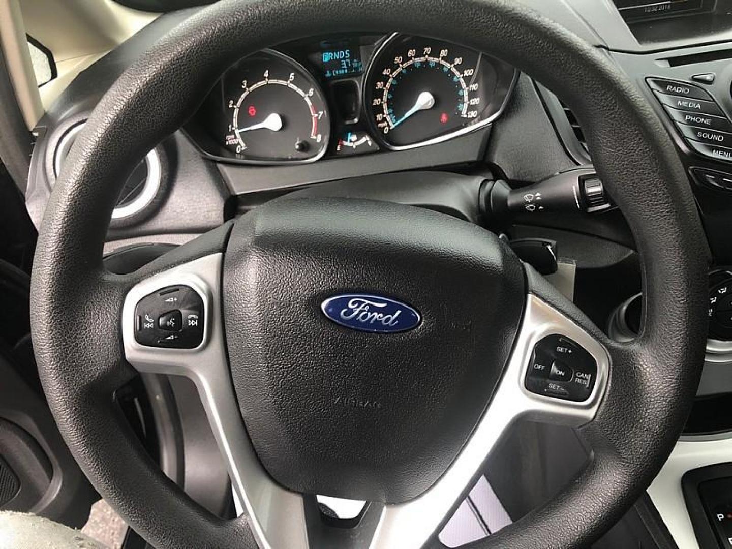 2019 BLACK /BLACK Ford Fiesta SE Sedan (3FADP4BJ4KM) with an 1.6L L4 DOHC 16V engine, Automatic transmission, located at 3304 Woodville Road, Northwood, OH, 43619, (419) 210-8019, 41.612694, -83.480743 - We are #1 Auto Loan Dealer for Good Bad or No Credit we have hundreds of vehicles to choose from, stop on in or just fill out our online application to get approved for auto financing and see your credit score for free by visiting our website today. We have Low Payment Options and Terms Available - Photo#17