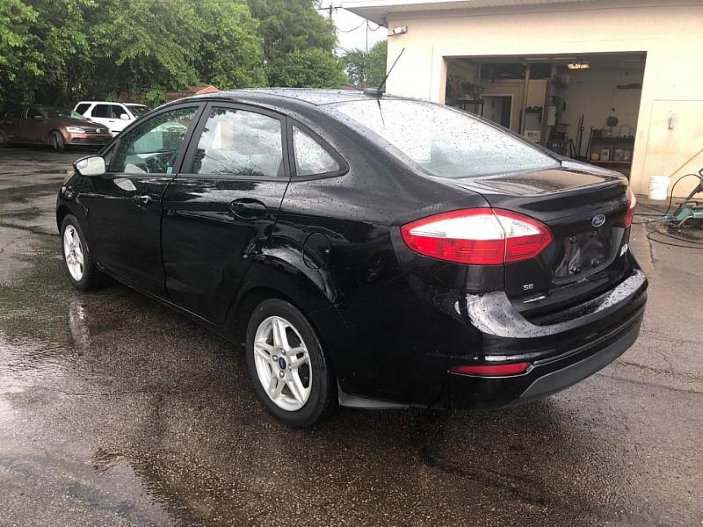 2019 BLACK /BLACK Ford Fiesta SE Sedan (3FADP4BJ4KM) with an 1.6L L4 DOHC 16V engine, Automatic transmission, located at 3304 Woodville Road, Northwood, OH, 43619, (419) 210-8019, 41.612694, -83.480743 - We are #1 Auto Loan Dealer for Good Bad or No Credit we have hundreds of vehicles to choose from, stop on in or just fill out our online application to get approved for auto financing and see your credit score for free by visiting our website today. We have Low Payment Options and Terms Available - Photo#2