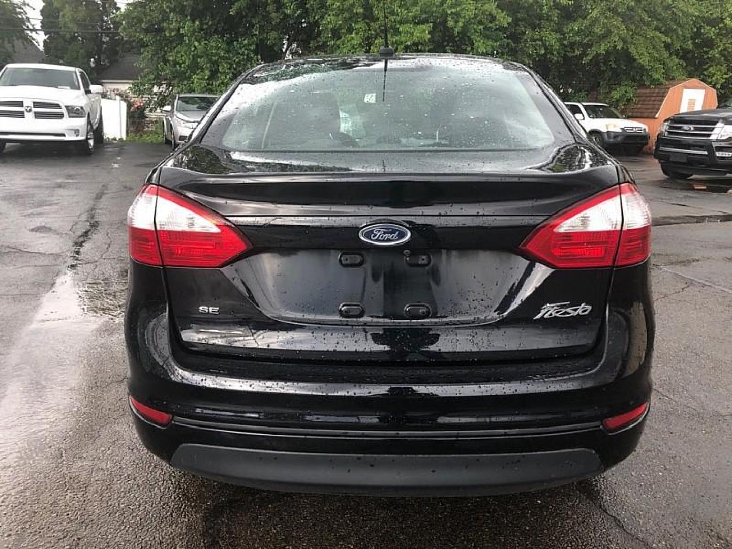 2019 BLACK /BLACK Ford Fiesta SE Sedan (3FADP4BJ4KM) with an 1.6L L4 DOHC 16V engine, Automatic transmission, located at 3304 Woodville Road, Northwood, OH, 43619, (419) 210-8019, 41.612694, -83.480743 - We are #1 Auto Loan Dealer for Good Bad or No Credit we have hundreds of vehicles to choose from, stop on in or just fill out our online application to get approved for auto financing and see your credit score for free by visiting our website today. We have Low Payment Options and Terms Available - Photo#3