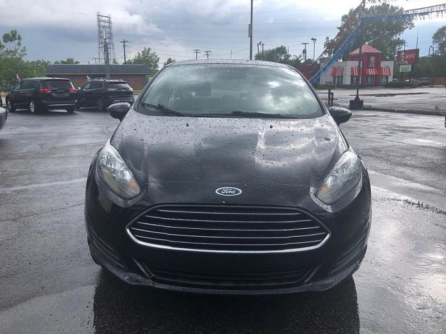 2019 BLACK /BLACK Ford Fiesta SE Sedan (3FADP4BJ4KM) with an 1.6L L4 DOHC 16V engine, Automatic transmission, located at 3304 Woodville Road, Northwood, OH, 43619, (419) 210-8019, 41.612694, -83.480743 - We are #1 Auto Loan Dealer for Good Bad or No Credit we have hundreds of vehicles to choose from, stop on in or just fill out our online application to get approved for auto financing and see your credit score for free by visiting our website today. We have Low Payment Options and Terms Available - Photo#7