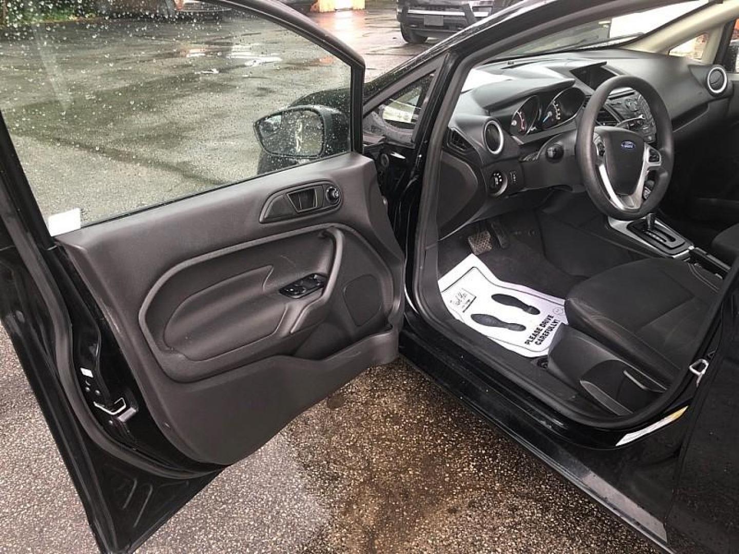 2019 BLACK /BLACK Ford Fiesta SE Sedan (3FADP4BJ4KM) with an 1.6L L4 DOHC 16V engine, Automatic transmission, located at 3304 Woodville Road, Northwood, OH, 43619, (419) 210-8019, 41.612694, -83.480743 - We are #1 Auto Loan Dealer for Good Bad or No Credit we have hundreds of vehicles to choose from, stop on in or just fill out our online application to get approved for auto financing and see your credit score for free by visiting our website today. We have Low Payment Options and Terms Available - Photo#8