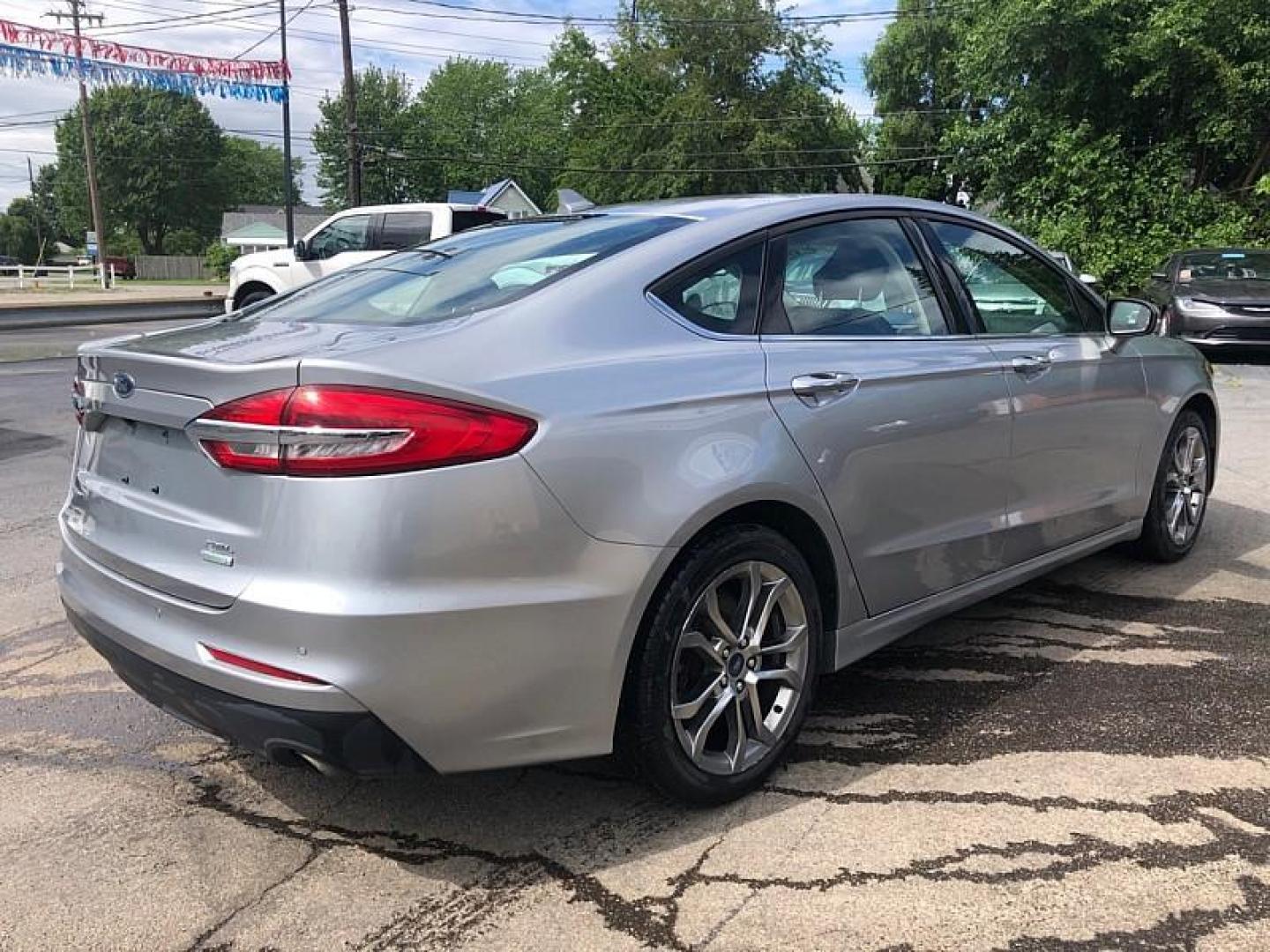 2020 SILVER /BLACK Ford Fusion SEL (3FA6P0CD5LR) with an 1.5L L4 DOHC 16V engine, 6A transmission, located at 3304 Woodville Road, Northwood, OH, 43619, (419) 210-8019, 41.612694, -83.480743 - We are #1 Auto Loan Dealer for Good Bad or No Credit we have hundreds of vehicles to choose from, stop on in or just fill out our online application to get approved for auto financing and see your credit score for free by visiting our website today. We have Low Payment Options and Terms Available - Photo#4