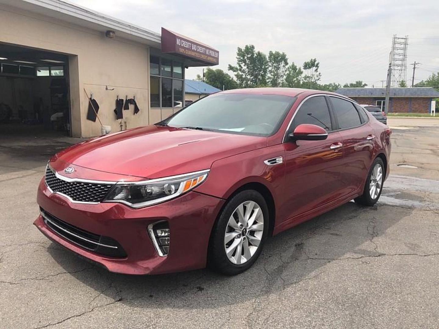 2018 RED /BLACK Kia Optima LX (5XXGT4L30JG) with an 2.4L L4 DOHC 16V engine, 6A transmission, located at 3304 Woodville Road, Northwood, OH, 43619, (419) 210-8019, 41.612694, -83.480743 - We are #1 Auto Loan Dealer for Good Bad or No Credit we have hundreds of vehicles to choose from, stop on in or just fill out our online application to get approved for auto financing and see your credit score for free by visiting our website today. We have Low Payment Options and Terms Available - Photo#0