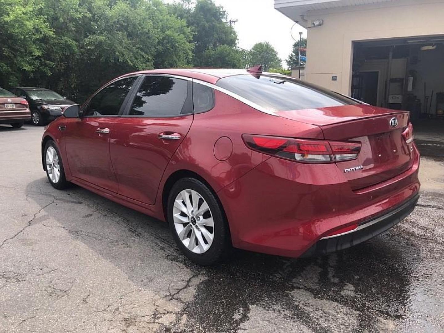 2018 RED /BLACK Kia Optima LX (5XXGT4L30JG) with an 2.4L L4 DOHC 16V engine, 6A transmission, located at 3304 Woodville Road, Northwood, OH, 43619, (419) 210-8019, 41.612694, -83.480743 - We are #1 Auto Loan Dealer for Good Bad or No Credit we have hundreds of vehicles to choose from, stop on in or just fill out our online application to get approved for auto financing and see your credit score for free by visiting our website today. We have Low Payment Options and Terms Available - Photo#2