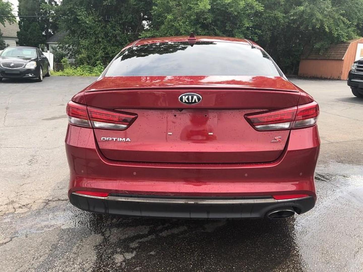 2018 RED /BLACK Kia Optima LX (5XXGT4L30JG) with an 2.4L L4 DOHC 16V engine, 6A transmission, located at 3304 Woodville Road, Northwood, OH, 43619, (419) 210-8019, 41.612694, -83.480743 - We are #1 Auto Loan Dealer for Good Bad or No Credit we have hundreds of vehicles to choose from, stop on in or just fill out our online application to get approved for auto financing and see your credit score for free by visiting our website today. We have Low Payment Options and Terms Available - Photo#3