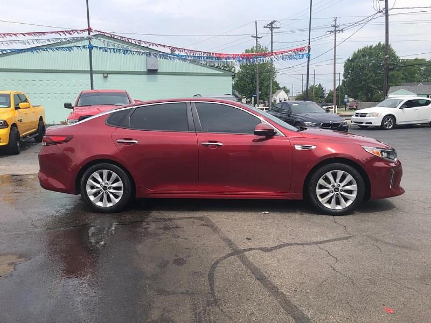 2018 RED /BLACK Kia Optima LX (5XXGT4L30JG) with an 2.4L L4 DOHC 16V engine, 6A transmission, located at 3304 Woodville Road, Northwood, OH, 43619, (419) 210-8019, 41.612694, -83.480743 - Photo#5