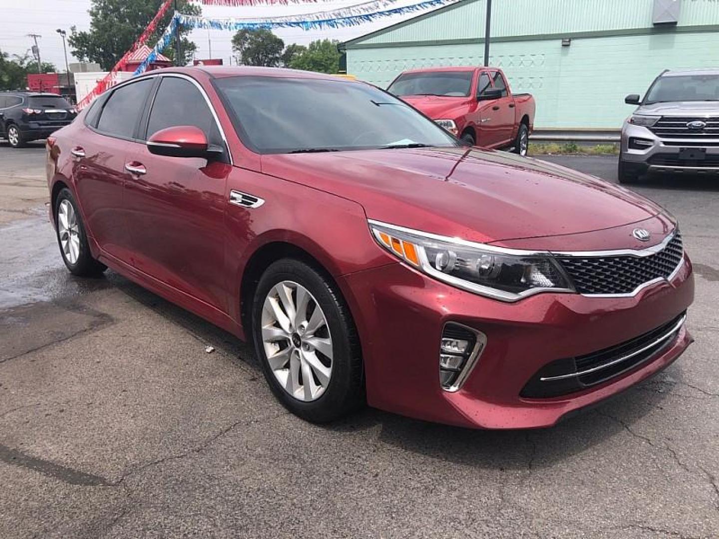 2018 RED /BLACK Kia Optima LX (5XXGT4L30JG) with an 2.4L L4 DOHC 16V engine, 6A transmission, located at 3304 Woodville Road, Northwood, OH, 43619, (419) 210-8019, 41.612694, -83.480743 - We are #1 Auto Loan Dealer for Good Bad or No Credit we have hundreds of vehicles to choose from, stop on in or just fill out our online application to get approved for auto financing and see your credit score for free by visiting our website today. We have Low Payment Options and Terms Available - Photo#6