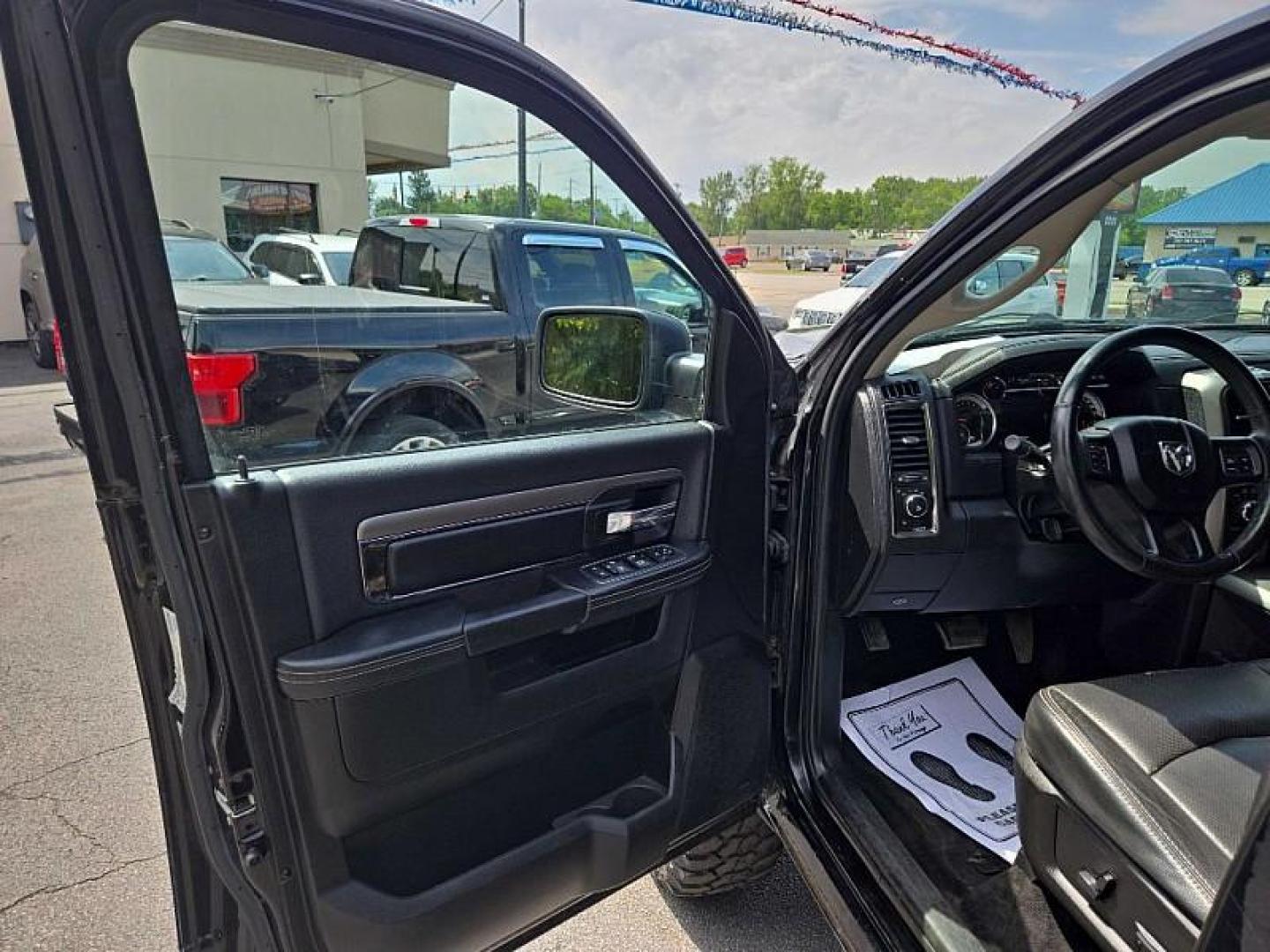 2013 BLACK /BLACK RAM 1500 Sport Crew Cab SWB 4WD (1C6RR7MT1DS) with an 5.7L V8 OHV 16V engine, 6-Speed Automatic transmission, located at 3304 Woodville Road, Northwood, OH, 43619, (419) 210-8019, 41.612694, -83.480743 - We are #1 Auto Loan Dealer for Good Bad or No Credit we have hundreds of vehicles to choose from, stop on in or just fill out our online application to get approved for auto financing and see your credit score for free by visiting our website today. We have Low Payment Options and Terms Available - Photo#13