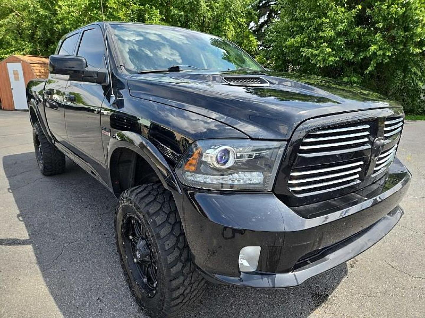 2013 BLACK /BLACK RAM 1500 Sport Crew Cab SWB 4WD (1C6RR7MT1DS) with an 5.7L V8 OHV 16V engine, 6-Speed Automatic transmission, located at 3304 Woodville Road, Northwood, OH, 43619, (419) 210-8019, 41.612694, -83.480743 - We are #1 Auto Loan Dealer for Good Bad or No Credit we have hundreds of vehicles to choose from, stop on in or just fill out our online application to get approved for auto financing and see your credit score for free by visiting our website today. We have Low Payment Options and Terms Available - Photo#4