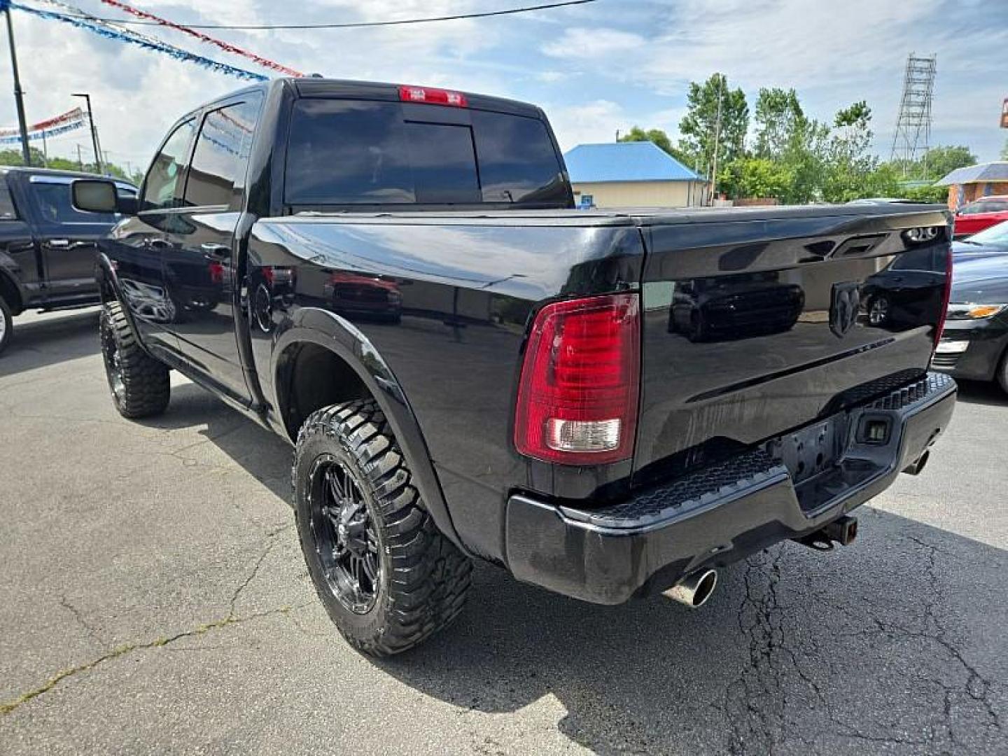 2013 BLACK /BLACK RAM 1500 Sport Crew Cab SWB 4WD (1C6RR7MT1DS) with an 5.7L V8 OHV 16V engine, 6-Speed Automatic transmission, located at 3304 Woodville Road, Northwood, OH, 43619, (419) 210-8019, 41.612694, -83.480743 - Photo#5