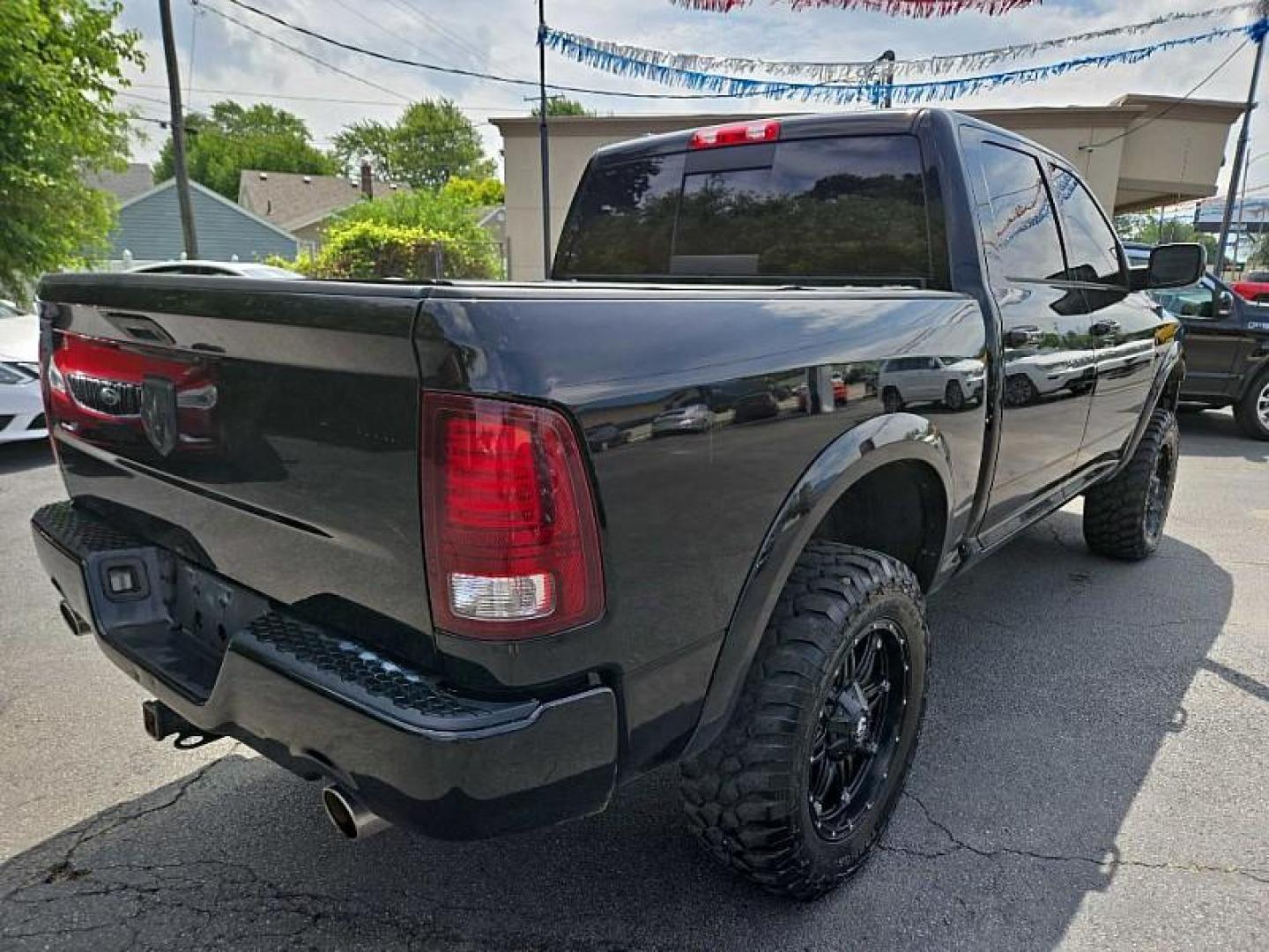 2013 BLACK /BLACK RAM 1500 Sport Crew Cab SWB 4WD (1C6RR7MT1DS) with an 5.7L V8 OHV 16V engine, 6-Speed Automatic transmission, located at 3304 Woodville Road, Northwood, OH, 43619, (419) 210-8019, 41.612694, -83.480743 - Photo#6