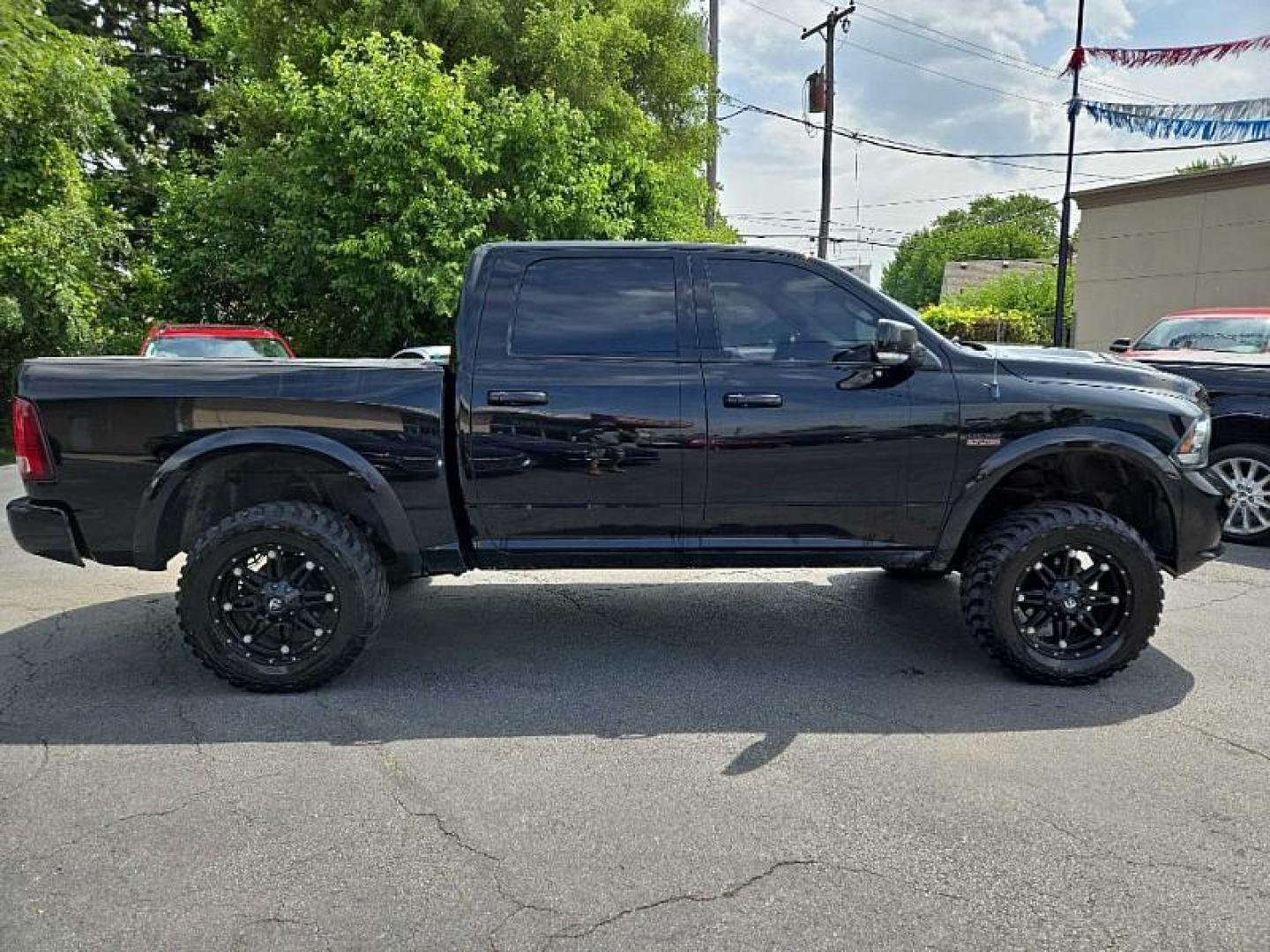 2013 BLACK /BLACK RAM 1500 Sport Crew Cab SWB 4WD (1C6RR7MT1DS) with an 5.7L V8 OHV 16V engine, 6-Speed Automatic transmission, located at 3304 Woodville Road, Northwood, OH, 43619, (419) 210-8019, 41.612694, -83.480743 - We are #1 Auto Loan Dealer for Good Bad or No Credit we have hundreds of vehicles to choose from, stop on in or just fill out our online application to get approved for auto financing and see your credit score for free by visiting our website today. We have Low Payment Options and Terms Available - Photo#5