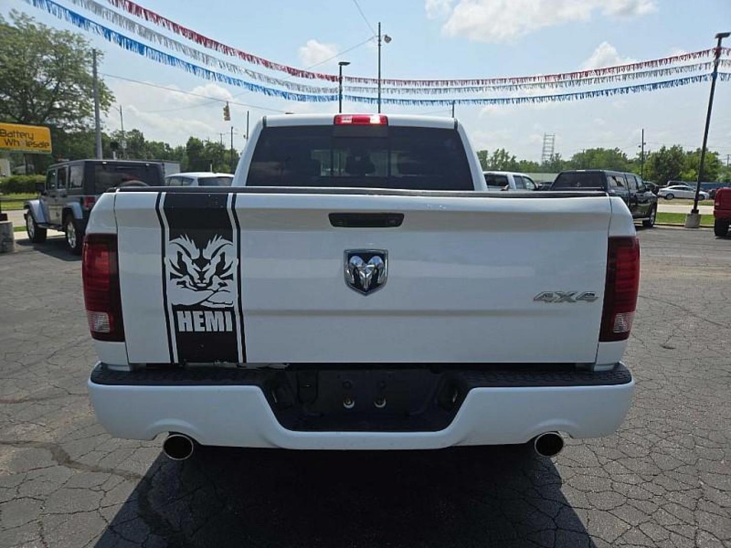 2016 WHITE /BLACK RAM 1500 Sport Crew Cab SWB 4WD (1C6RR7MT5GS) with an 5.7L V8 OHV 16V engine, 6A transmission, located at 3304 Woodville Road, Northwood, OH, 43619, (419) 210-8019, 41.612694, -83.480743 - We are #1 Auto Loan Dealer for Good Bad or No Credit we have hundreds of vehicles to choose from, stop on in or just fill out our online application to get approved for auto financing and see your credit score for free by visiting our website today. We have Low Payment Options and Terms Available - Photo#3