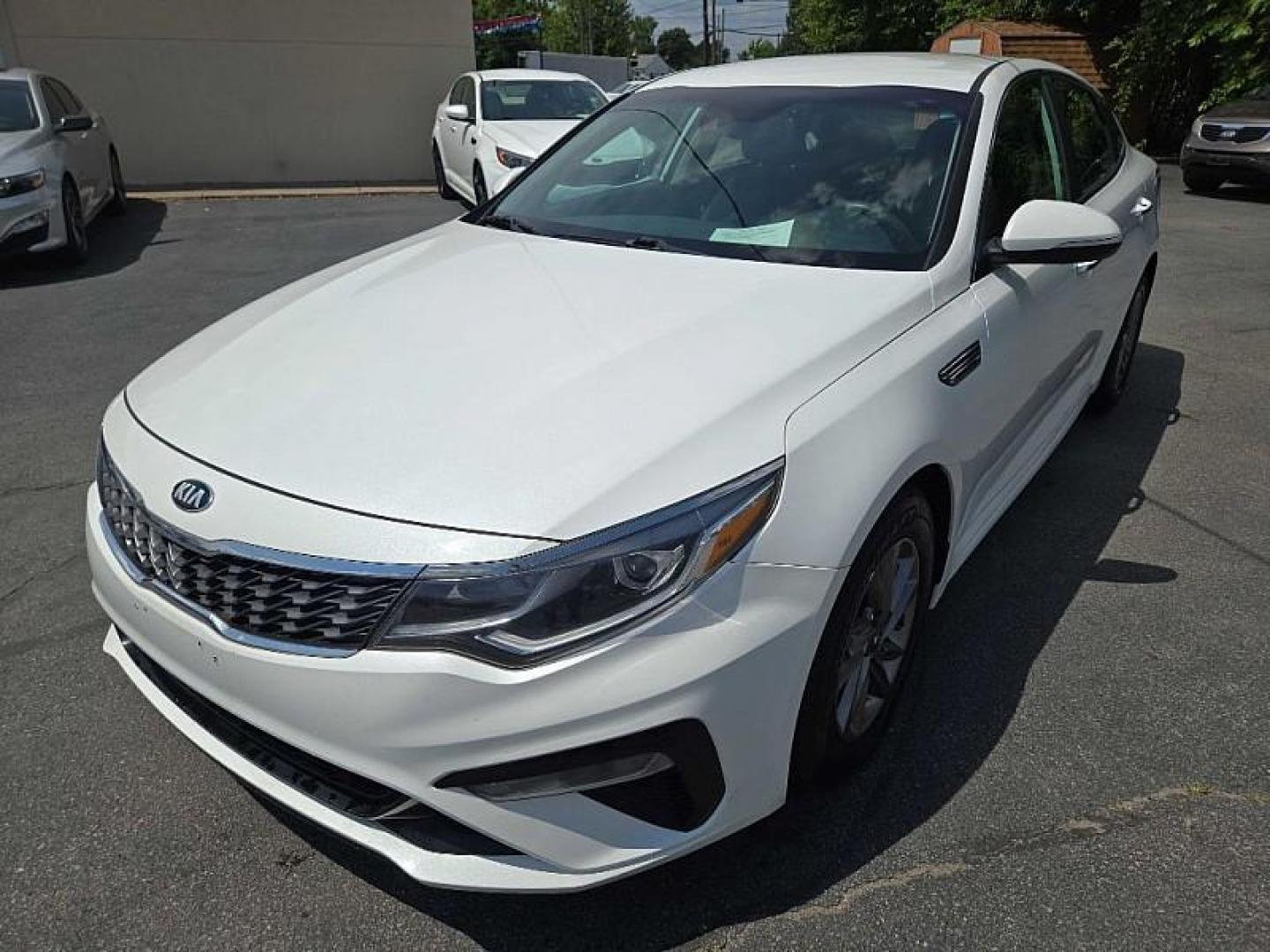 2020 WHITE /BLACK Kia Optima LX (5XXGT4L30LG) with an 2.4L L4 DOHC 16V engine, 6A transmission, located at 3304 Woodville Road, Northwood, OH, 43619, (419) 210-8019, 41.612694, -83.480743 - We are #1 Auto Loan Dealer for Good Bad or No Credit we have hundreds of vehicles to choose from, stop on in or just fill out our online application to get approved for auto financing and see your credit score for free by visiting our website today. We have Low Payment Options and Terms Available - Photo#0