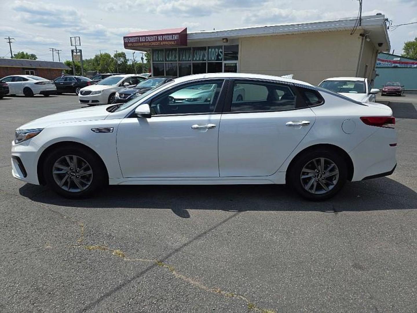 2020 WHITE /BLACK Kia Optima LX (5XXGT4L30LG) with an 2.4L L4 DOHC 16V engine, 6A transmission, located at 3304 Woodville Road, Northwood, OH, 43619, (419) 210-8019, 41.612694, -83.480743 - We are #1 Auto Loan Dealer for Good Bad or No Credit we have hundreds of vehicles to choose from, stop on in or just fill out our online application to get approved for auto financing and see your credit score for free by visiting our website today. We have Low Payment Options and Terms Available - Photo#1