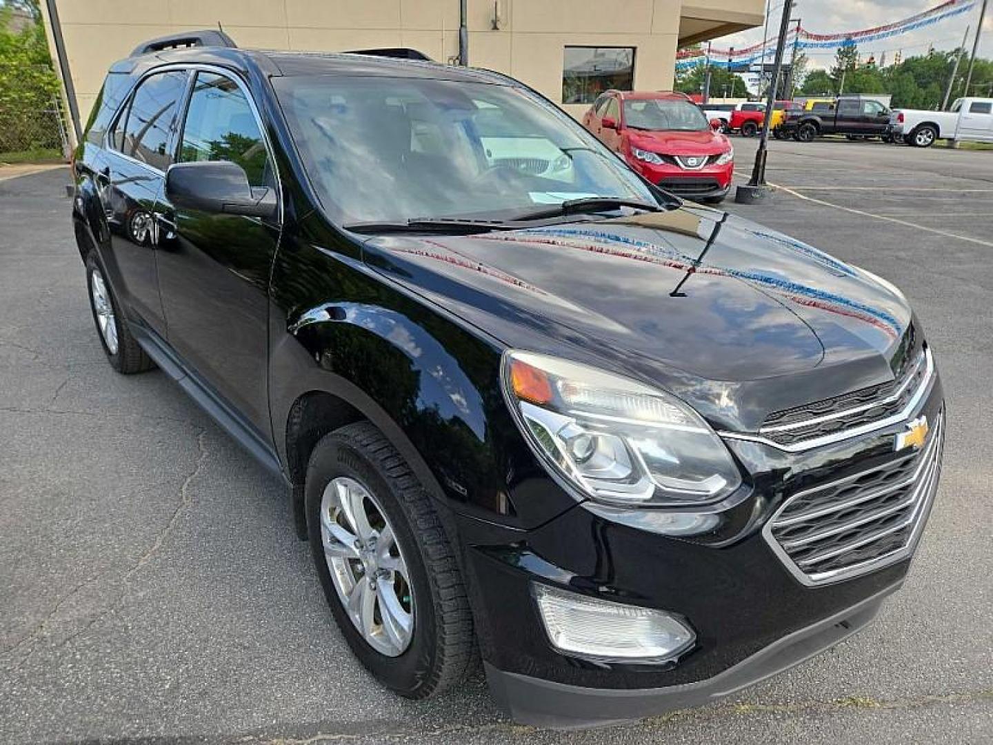 2017 BLACK /BLACK Chevrolet Equinox LT AWD (2GNFLFEK6H6) with an 2.4L L4 DOHC 16V FFV engine, 6A transmission, located at 3304 Woodville Road, Northwood, OH, 43619, (419) 210-8019, 41.612694, -83.480743 - Photo#9