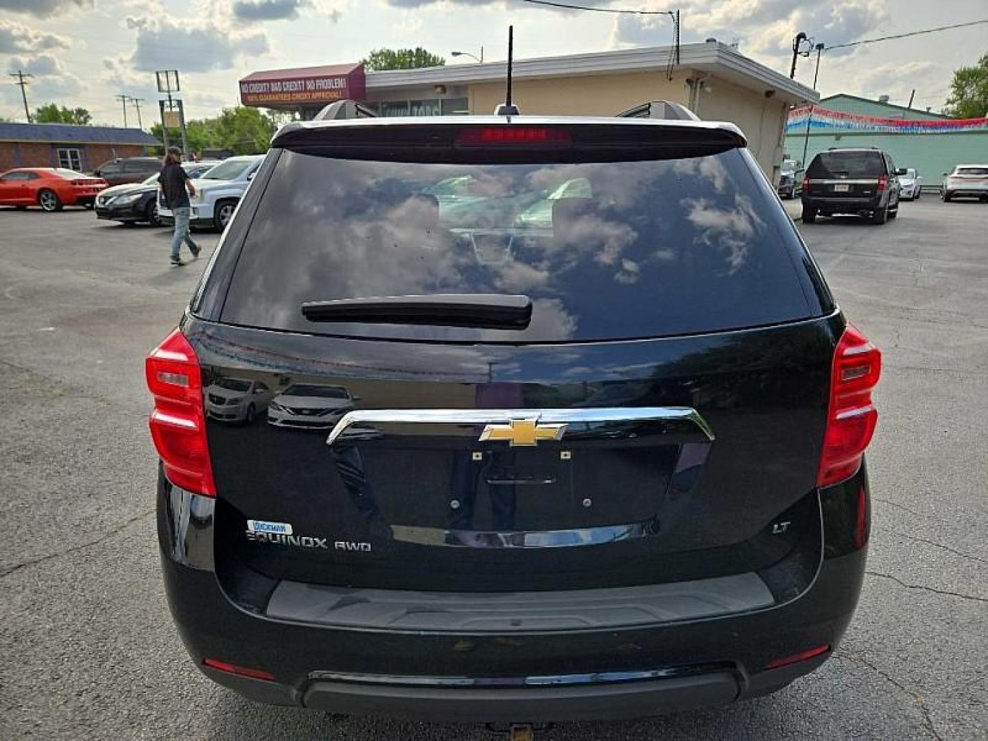 2017 BLACK /BLACK Chevrolet Equinox LT AWD (2GNFLFEK6H6) with an 2.4L L4 DOHC 16V FFV engine, 6A transmission, located at 3304 Woodville Road, Northwood, OH, 43619, (419) 210-8019, 41.612694, -83.480743 - Photo#2