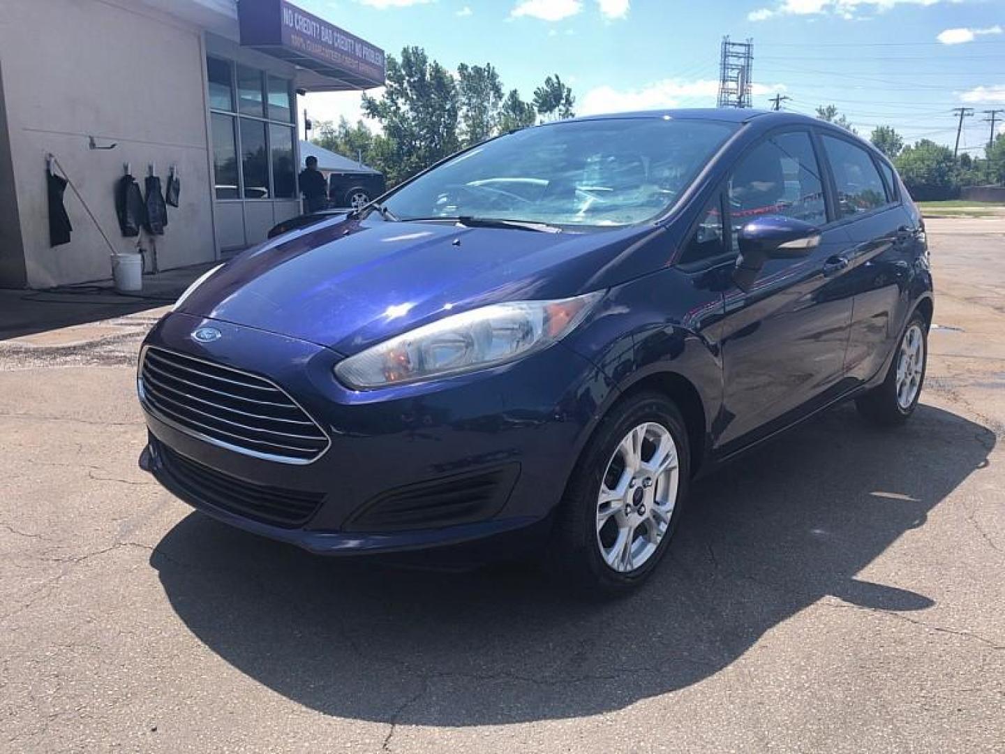 2016 BLUE /BLACK Ford Fiesta SE Hatchback (3FADP4EJ7GM) with an 1.6L L4 DOHC 16V engine, Auto 6-Spd SelectShift transmission, located at 3304 Woodville Road, Northwood, OH, 43619, (419) 210-8019, 41.612694, -83.480743 - We are #1 Auto Loan Dealer for Good Bad or No Credit we have hundreds of vehicles to choose from, stop on in or just fill out our online application to get approved for auto financing and see your credit score for free by visiting our website today. We have Low Payment Options and Terms Available - Photo#0