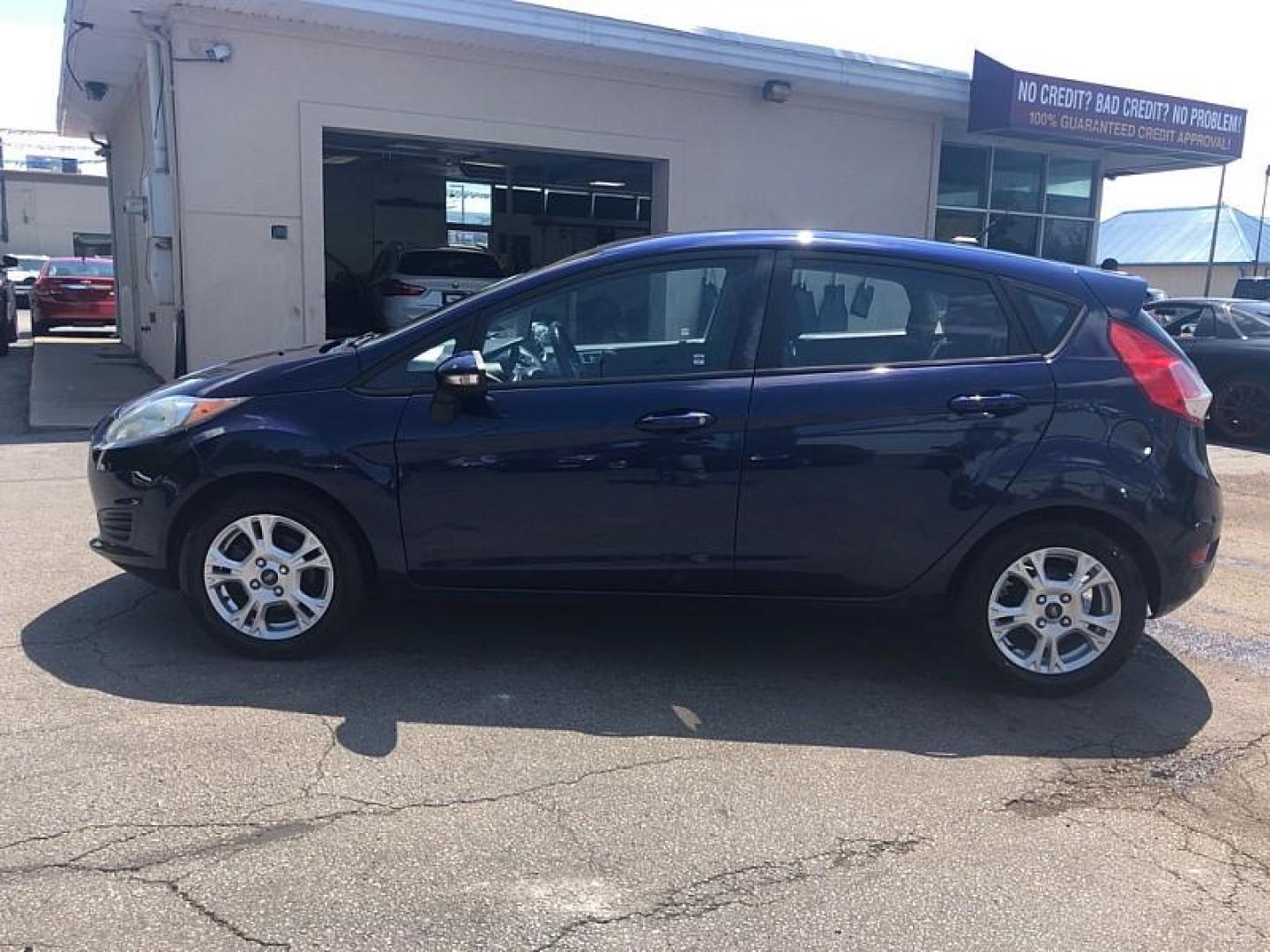 2016 BLUE /BLACK Ford Fiesta SE Hatchback (3FADP4EJ7GM) with an 1.6L L4 DOHC 16V engine, Auto 6-Spd SelectShift transmission, located at 3304 Woodville Road, Northwood, OH, 43619, (419) 210-8019, 41.612694, -83.480743 - We are #1 Auto Loan Dealer for Good Bad or No Credit we have hundreds of vehicles to choose from, stop on in or just fill out our online application to get approved for auto financing and see your credit score for free by visiting our website today. We have Low Payment Options and Terms Available - Photo#1