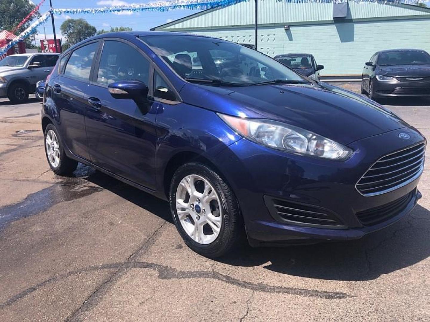 2016 BLUE /BLACK Ford Fiesta SE Hatchback (3FADP4EJ7GM) with an 1.6L L4 DOHC 16V engine, Auto 6-Spd SelectShift transmission, located at 3304 Woodville Road, Northwood, OH, 43619, (419) 210-8019, 41.612694, -83.480743 - We are #1 Auto Loan Dealer for Good Bad or No Credit we have hundreds of vehicles to choose from, stop on in or just fill out our online application to get approved for auto financing and see your credit score for free by visiting our website today. We have Low Payment Options and Terms Available - Photo#6