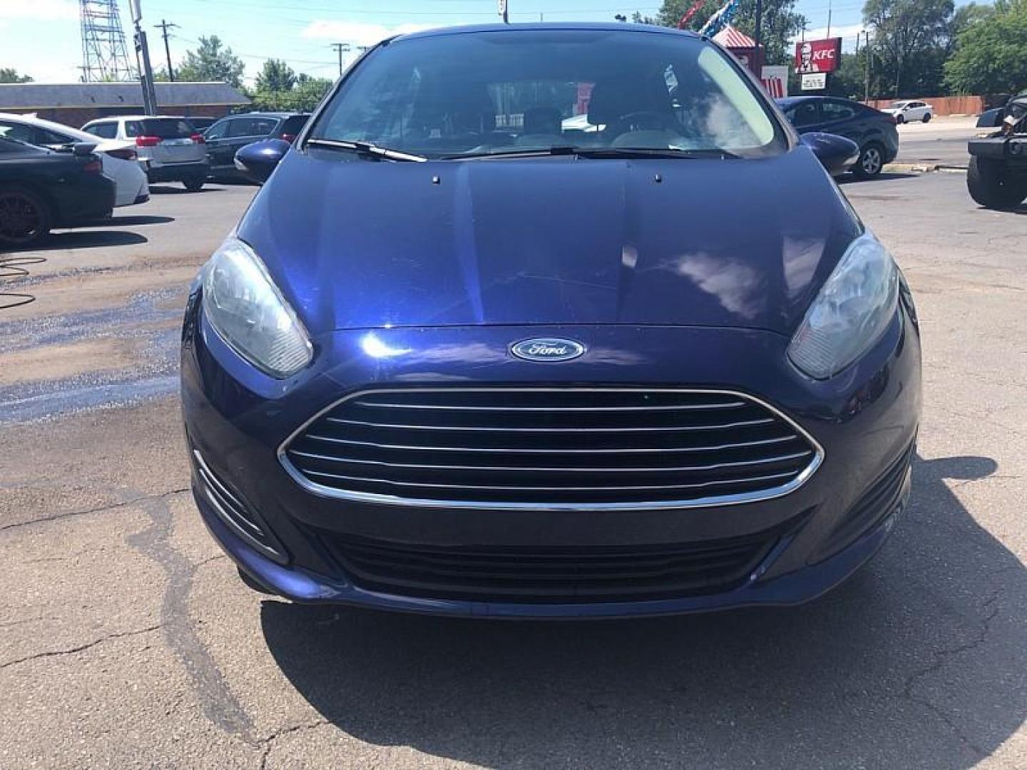 2016 BLUE /BLACK Ford Fiesta SE Hatchback (3FADP4EJ7GM) with an 1.6L L4 DOHC 16V engine, Auto 6-Spd SelectShift transmission, located at 3304 Woodville Road, Northwood, OH, 43619, (419) 210-8019, 41.612694, -83.480743 - We are #1 Auto Loan Dealer for Good Bad or No Credit we have hundreds of vehicles to choose from, stop on in or just fill out our online application to get approved for auto financing and see your credit score for free by visiting our website today. We have Low Payment Options and Terms Available - Photo#7