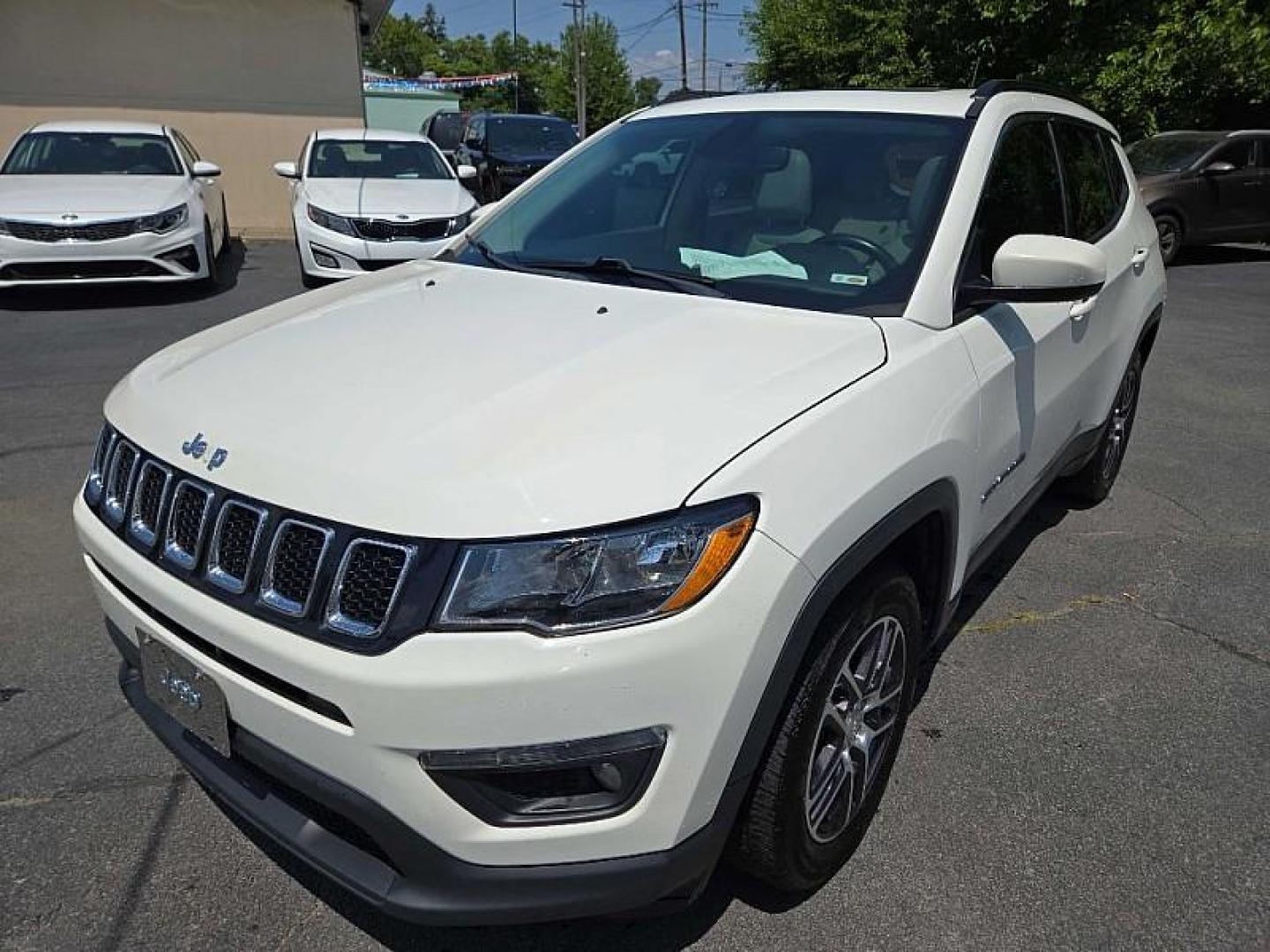 2018 WHITE /WHITE Jeep Compass Sport FWD (3C4NJCBB3JT) with an 2.4L L4 DOHC 16V engine, Automatic 6-Spd transmission, located at 3304 Woodville Road, Northwood, OH, 43619, (419) 210-8019, 41.612694, -83.480743 - We are #1 Auto Loan Dealer for Good Bad or No Credit we have hundreds of vehicles to choose from, stop on in or just fill out our online application to get approved for auto financing and see your credit score for free by visiting our website today. We have Low Payment Options and Terms Available - Photo#0