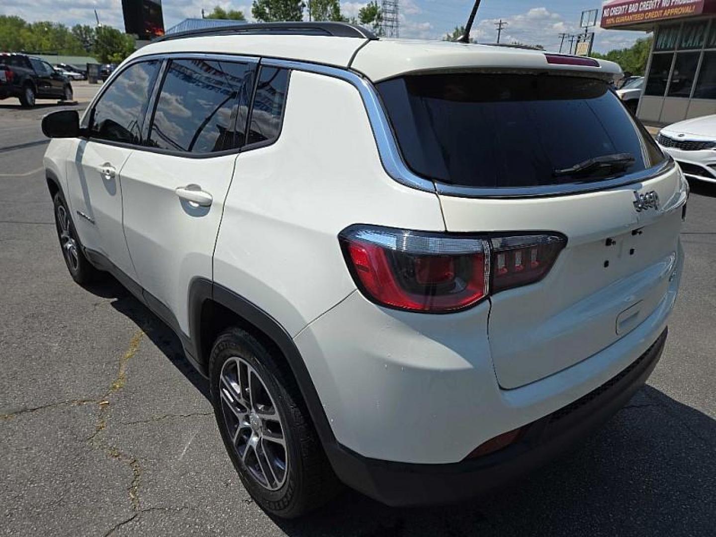 2018 WHITE /WHITE Jeep Compass Sport FWD (3C4NJCBB3JT) with an 2.4L L4 DOHC 16V engine, Automatic 6-Spd transmission, located at 3304 Woodville Road, Northwood, OH, 43619, (419) 210-8019, 41.612694, -83.480743 - We are #1 Auto Loan Dealer for Good Bad or No Credit we have hundreds of vehicles to choose from, stop on in or just fill out our online application to get approved for auto financing and see your credit score for free by visiting our website today. We have Low Payment Options and Terms Available - Photo#2