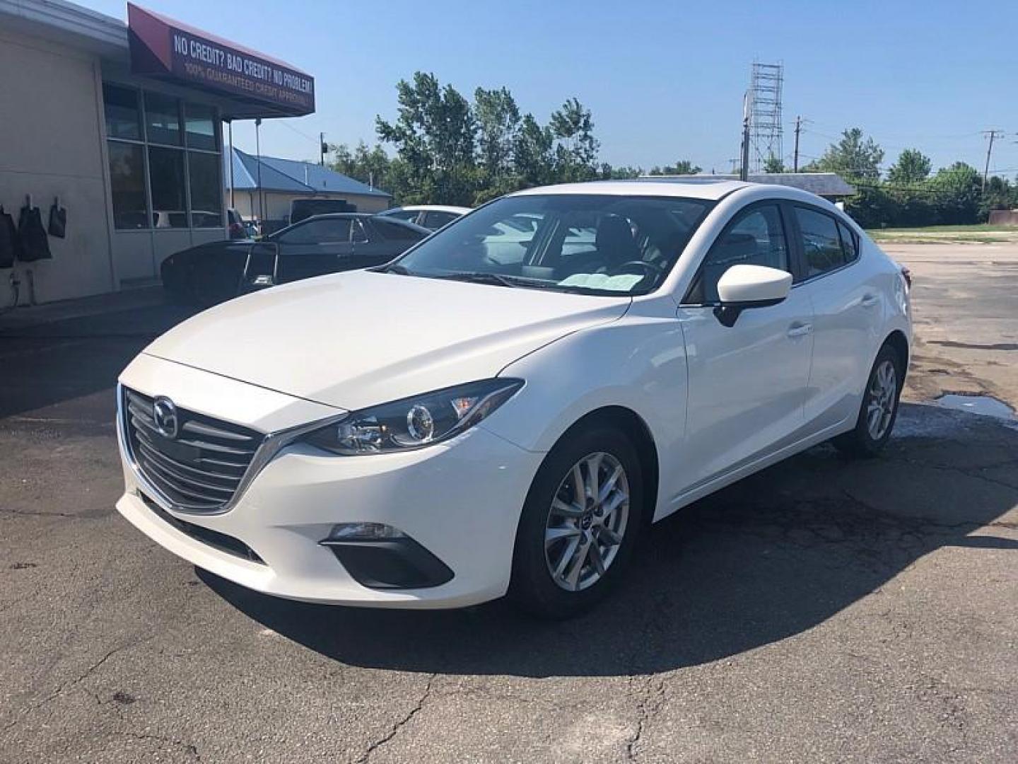 2014 WHITE /BLACK Mazda MAZDA3 i Grand Touring AT 4-Door (JM1BM1W76E1) with an 2.0L L4 DOHC 16V engine, 6-Speed Automatic transmission, located at 3304 Woodville Road, Northwood, OH, 43619, (419) 210-8019, 41.612694, -83.480743 - Your #1 Destination for Auto Loans and mdash;No Matter Your Credit!At our dealership, we cater to everyone and mdash;whether you have good, bad, or no credit. With hundreds of vehicles to choose from, you can easily find the perfect car, truck, or SUV that fits your needs.Get Approved Today!Visit ou - Photo#0