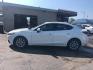 2014 WHITE /BLACK Mazda MAZDA3 i Grand Touring AT 4-Door (JM1BM1W76E1) with an 2.0L L4 DOHC 16V engine, 6-Speed Automatic transmission, located at 3304 Woodville Road, Northwood, OH, 43619, (419) 210-8019, 41.612694, -83.480743 - Your #1 Destination for Auto Loans and mdash;No Matter Your Credit!At our dealership, we cater to everyone and mdash;whether you have good, bad, or no credit. With hundreds of vehicles to choose from, you can easily find the perfect car, truck, or SUV that fits your needs.Get Approved Today!Visit ou - Photo#1