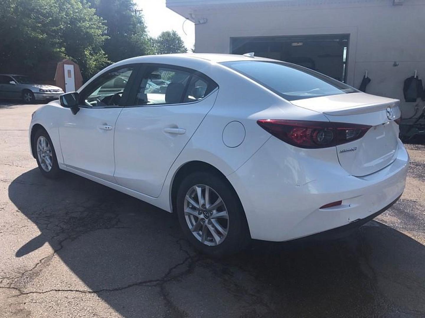 2014 WHITE /BLACK Mazda MAZDA3 i Grand Touring AT 4-Door (JM1BM1W76E1) with an 2.0L L4 DOHC 16V engine, 6-Speed Automatic transmission, located at 3304 Woodville Road, Northwood, OH, 43619, (419) 210-8019, 41.612694, -83.480743 - Your #1 Destination for Auto Loans and mdash;No Matter Your Credit!At our dealership, we cater to everyone and mdash;whether you have good, bad, or no credit. With hundreds of vehicles to choose from, you can easily find the perfect car, truck, or SUV that fits your needs.Get Approved Today!Visit ou - Photo#2