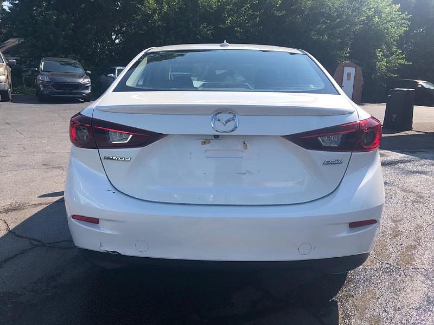 2014 WHITE /BLACK Mazda MAZDA3 i Grand Touring AT 4-Door (JM1BM1W76E1) with an 2.0L L4 DOHC 16V engine, 6-Speed Automatic transmission, located at 3304 Woodville Road, Northwood, OH, 43619, (419) 210-8019, 41.612694, -83.480743 - Your #1 Destination for Auto Loans and mdash;No Matter Your Credit!At our dealership, we cater to everyone and mdash;whether you have good, bad, or no credit. With hundreds of vehicles to choose from, you can easily find the perfect car, truck, or SUV that fits your needs.Get Approved Today!Visit ou - Photo#3