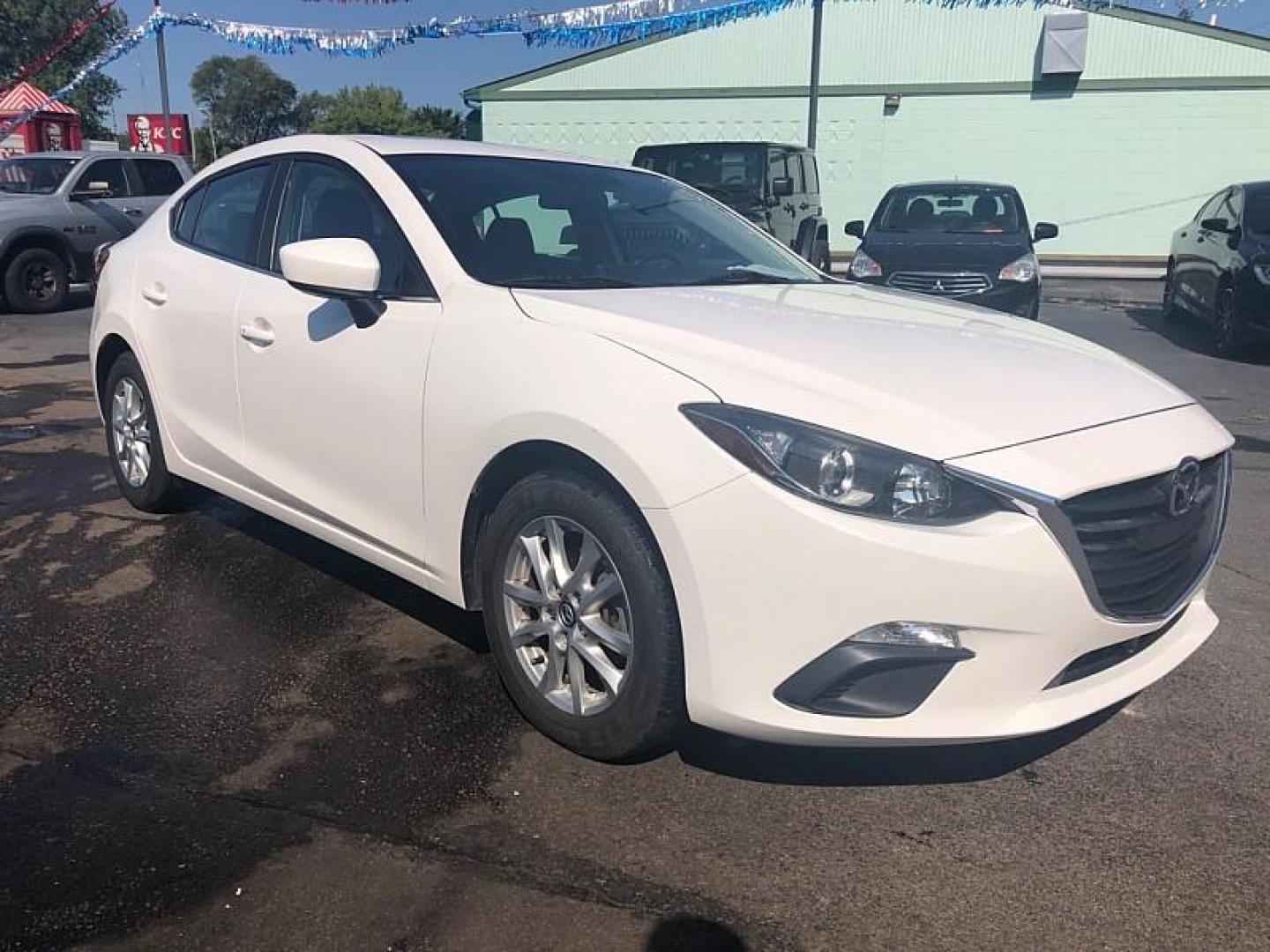 2014 WHITE /BLACK Mazda MAZDA3 i Grand Touring AT 4-Door (JM1BM1W76E1) with an 2.0L L4 DOHC 16V engine, 6-Speed Automatic transmission, located at 3304 Woodville Road, Northwood, OH, 43619, (419) 210-8019, 41.612694, -83.480743 - Your #1 Destination for Auto Loans and mdash;No Matter Your Credit!At our dealership, we cater to everyone and mdash;whether you have good, bad, or no credit. With hundreds of vehicles to choose from, you can easily find the perfect car, truck, or SUV that fits your needs.Get Approved Today!Visit ou - Photo#6