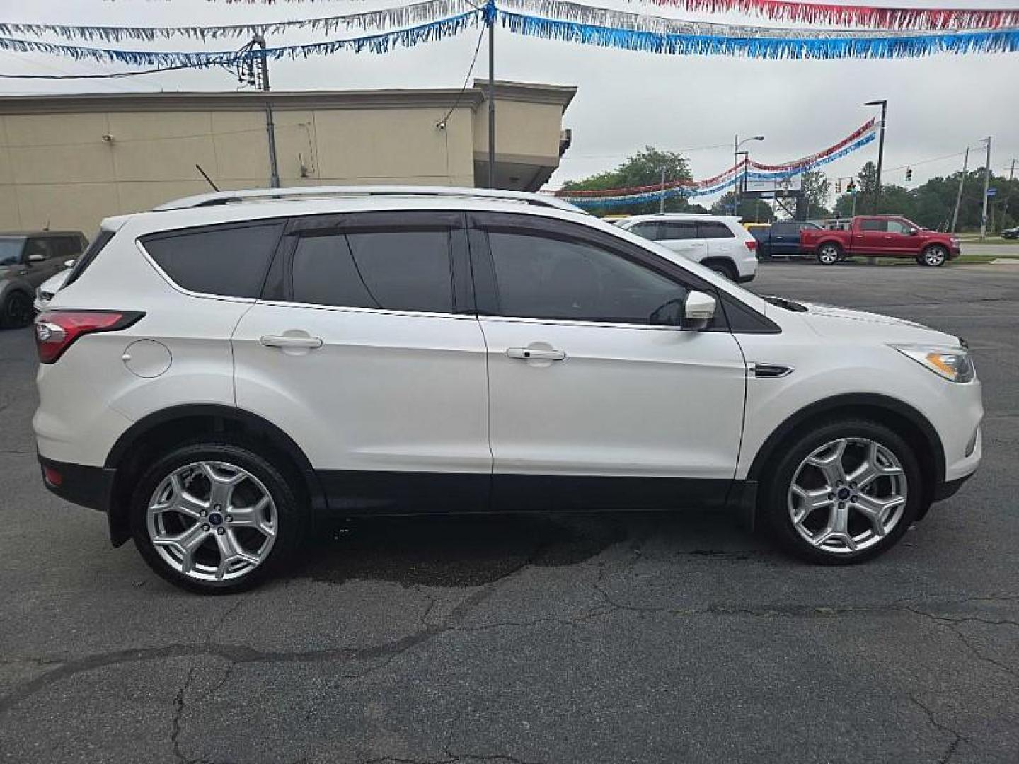 2018 WHITE /TAN Ford Escape Titanium 4WD (1FMCU9J98JU) with an 2.0L L4 DOHC 16V engine, 6A transmission, located at 3304 Woodville Road, Northwood, OH, 43619, (419) 210-8019, 41.612694, -83.480743 - We are #1 Auto Loan Dealer for Good Bad or No Credit we have hundreds of vehicles to choose from, stop on in or just fill out our online application to get approved for auto financing and see your credit score for free by visiting our website today. We have Low Payment Options and Terms Available - Photo#3