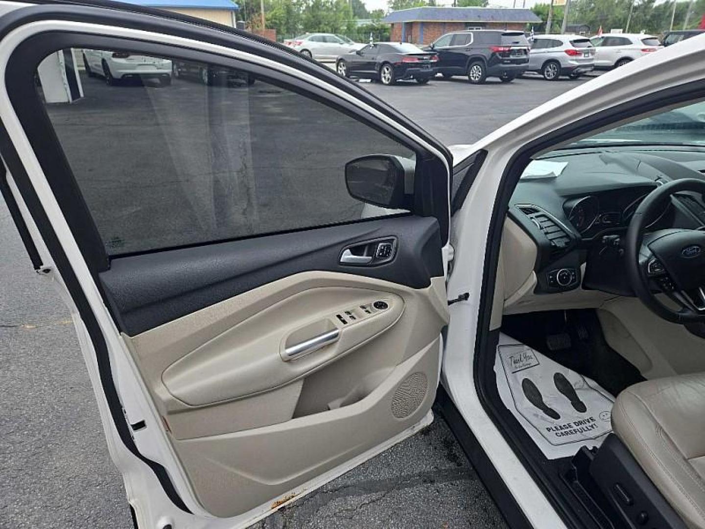 2018 WHITE /TAN Ford Escape Titanium 4WD (1FMCU9J98JU) with an 2.0L L4 DOHC 16V engine, 6A transmission, located at 3304 Woodville Road, Northwood, OH, 43619, (419) 210-8019, 41.612694, -83.480743 - We are #1 Auto Loan Dealer for Good Bad or No Credit we have hundreds of vehicles to choose from, stop on in or just fill out our online application to get approved for auto financing and see your credit score for free by visiting our website today. We have Low Payment Options and Terms Available - Photo#5