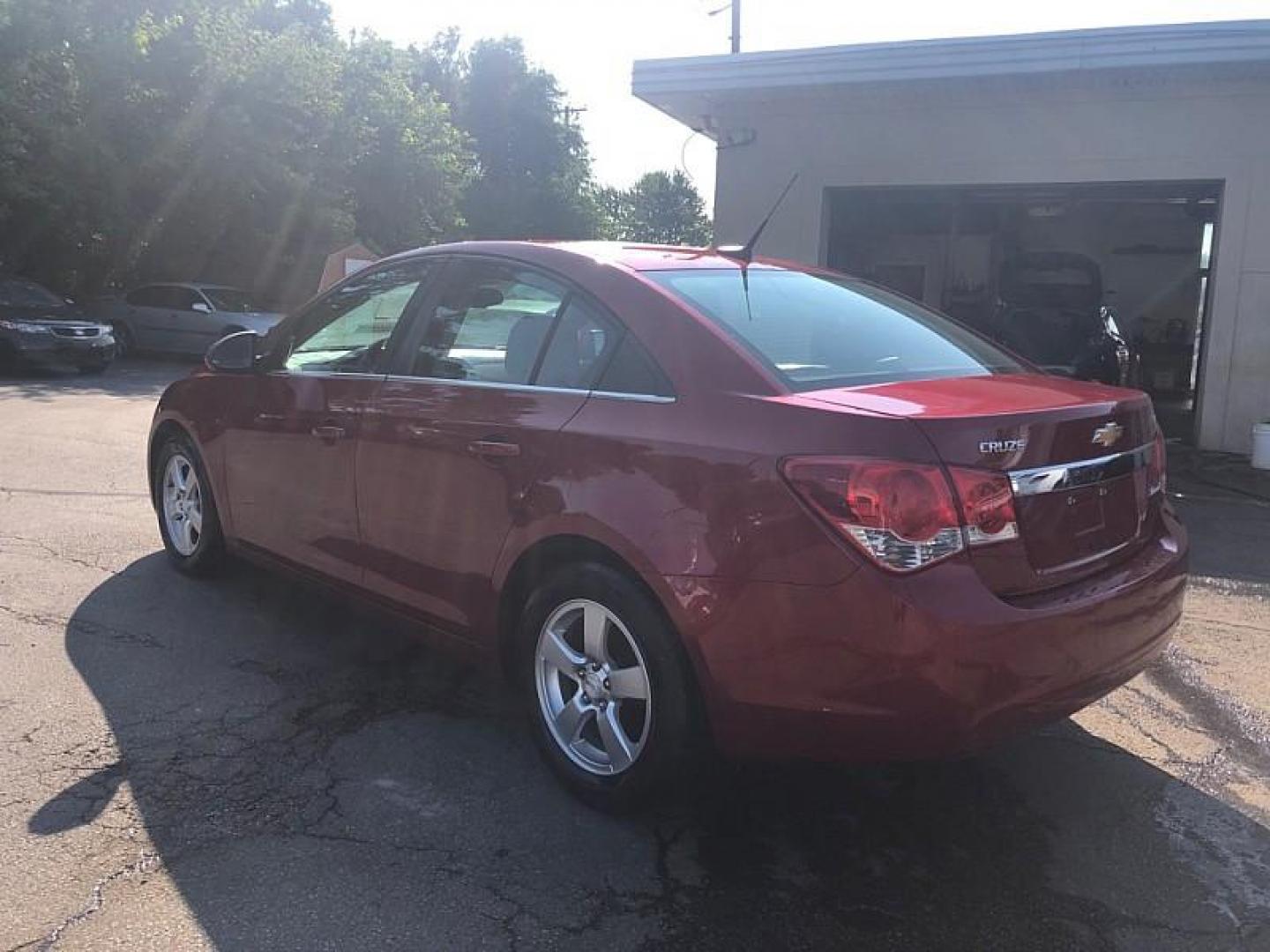 2014 RED /BLACK Chevrolet Cruze 1LT Auto (1G1PC5SB4E7) with an 1.4L L4 DOHC 16V TURBO engine, 6-Speed Automatic transmission, located at 3304 Woodville Road, Northwood, OH, 43619, (419) 210-8019, 41.612694, -83.480743 - We are #1 Auto Loan Dealer for Good Bad or No Credit we have hundreds of vehicles to choose from, stop on in or just fill out our online application to get approved for auto financing and see your credit score for free by visiting our website today. We have Low Payment Options and Terms Available - Photo#2