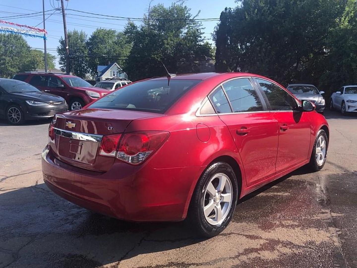 2014 RED /BLACK Chevrolet Cruze 1LT Auto (1G1PC5SB4E7) with an 1.4L L4 DOHC 16V TURBO engine, 6-Speed Automatic transmission, located at 3304 Woodville Road, Northwood, OH, 43619, (419) 210-8019, 41.612694, -83.480743 - We are #1 Auto Loan Dealer for Good Bad or No Credit we have hundreds of vehicles to choose from, stop on in or just fill out our online application to get approved for auto financing and see your credit score for free by visiting our website today. We have Low Payment Options and Terms Available - Photo#4