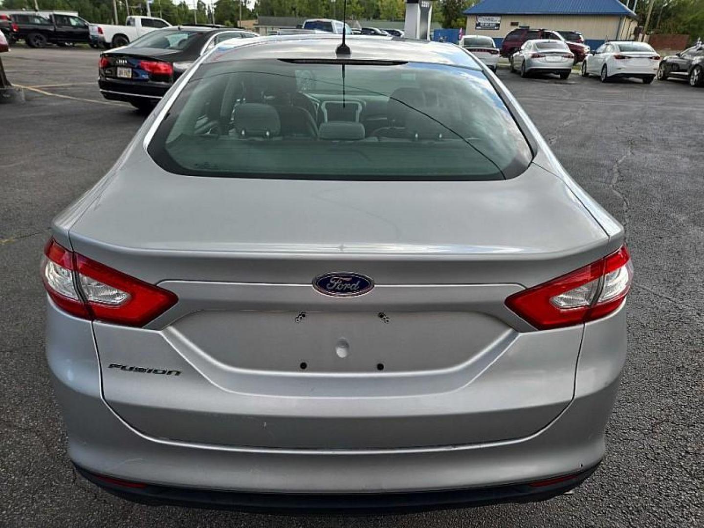 2013 SILVER /TAN Ford Fusion S (3FA6P0G75DR) with an 2.5L L4 DOHC 16V engine, Automatic 6-Spd transmission, located at 3304 Woodville Road, Northwood, OH, 43619, (419) 210-8019, 41.612694, -83.480743 - We are #1 Auto Loan Dealer for Good Bad or No Credit we have hundreds of vehicles to choose from, stop on in or just fill out our online application to get approved for auto financing and see your credit score for free by visiting our website today. We have Low Payment Options and Terms Available - Photo#3