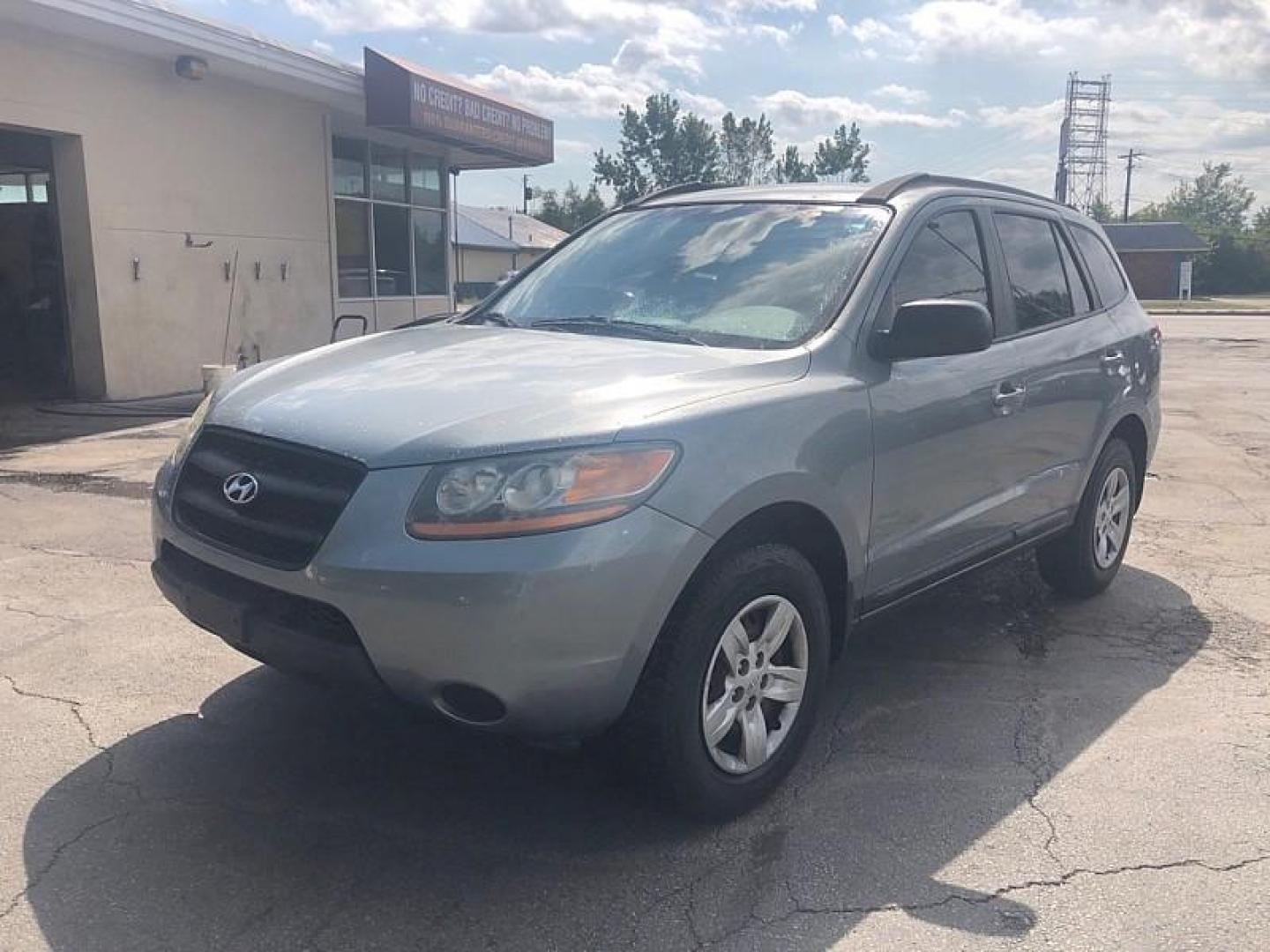 2009 SILVER /GREY Hyundai Santa Fe GLS (5NMSG13D39H) with an 2.7L V6 DOHC 24V engine, Automatic 4-Spd w/Overdrive and Shiftronic transmission, located at 3304 Woodville Road, Northwood, OH, 43619, (419) 210-8019, 41.612694, -83.480743 - Photo#0