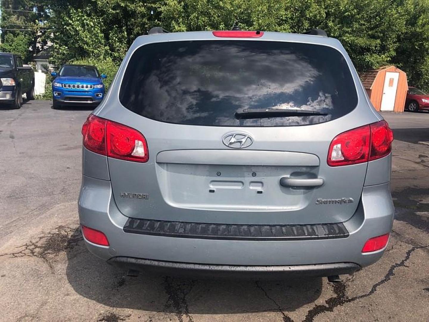 2009 SILVER /GREY Hyundai Santa Fe GLS (5NMSG13D39H) with an 2.7L V6 DOHC 24V engine, Automatic 4-Spd w/Overdrive and Shiftronic transmission, located at 3304 Woodville Road, Northwood, OH, 43619, (419) 210-8019, 41.612694, -83.480743 - Photo#3