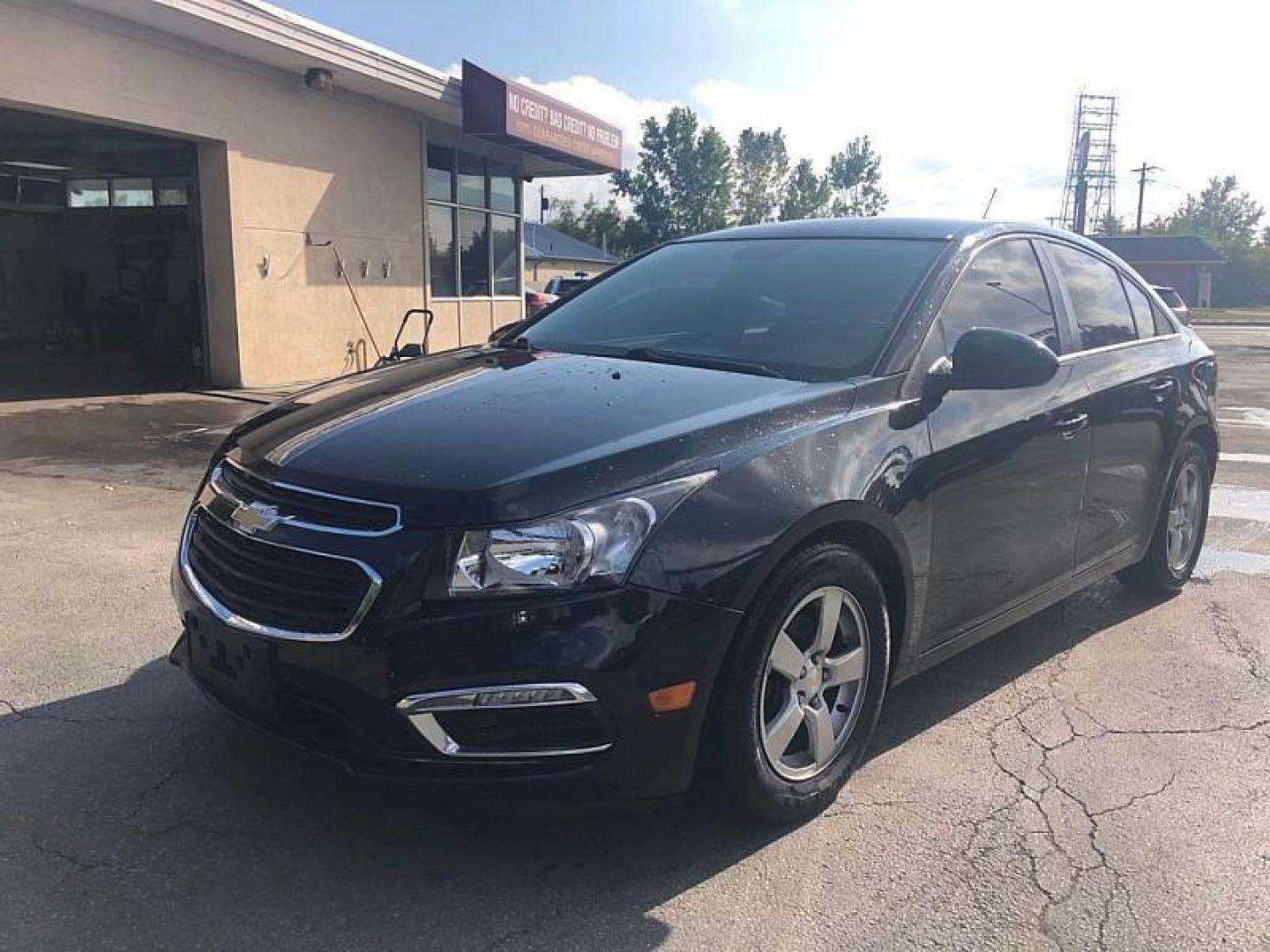 2016 BLACK /BLACK Chevrolet Cruze 2LT Auto (1G1PE5SB9G7) with an 1.4L L4 DOHC 16V TURBO engine, 6-Speed Automatic transmission, located at 3304 Woodville Road, Northwood, OH, 43619, (419) 210-8019, 41.612694, -83.480743 - We are #1 Auto Loan Dealer for Good Bad or No Credit we have hundreds of vehicles to choose from, stop on in or just fill out our online application to get approved for auto financing and see your credit score for free by visiting our website today. We have Low Payment Options and Terms Available - Photo#0