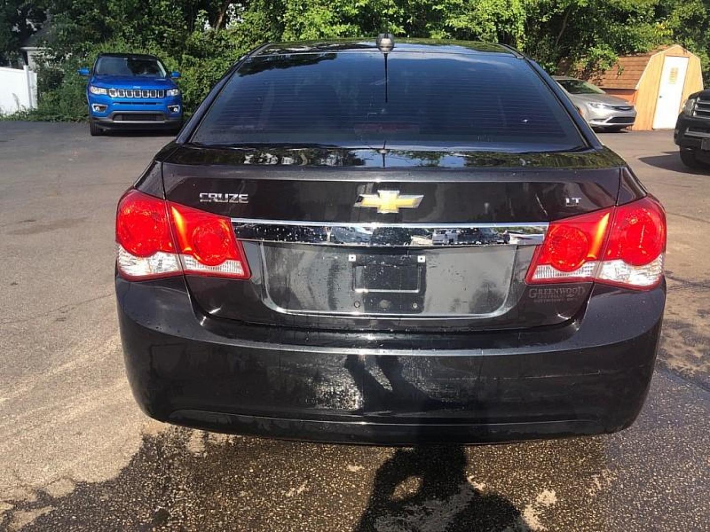 2016 BLACK /BLACK Chevrolet Cruze 2LT Auto (1G1PE5SB9G7) with an 1.4L L4 DOHC 16V TURBO engine, 6-Speed Automatic transmission, located at 3304 Woodville Road, Northwood, OH, 43619, (419) 210-8019, 41.612694, -83.480743 - We are #1 Auto Loan Dealer for Good Bad or No Credit we have hundreds of vehicles to choose from, stop on in or just fill out our online application to get approved for auto financing and see your credit score for free by visiting our website today. We have Low Payment Options and Terms Available - Photo#3