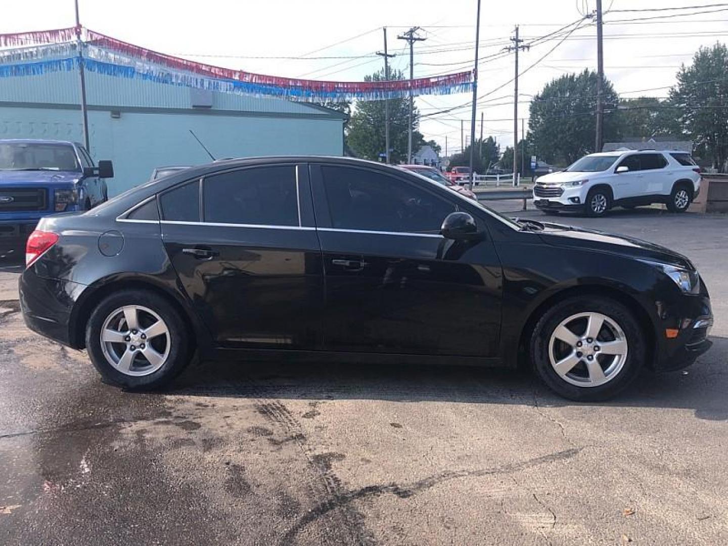 2016 BLACK /BLACK Chevrolet Cruze 2LT Auto (1G1PE5SB9G7) with an 1.4L L4 DOHC 16V TURBO engine, 6-Speed Automatic transmission, located at 3304 Woodville Road, Northwood, OH, 43619, (419) 210-8019, 41.612694, -83.480743 - We are #1 Auto Loan Dealer for Good Bad or No Credit we have hundreds of vehicles to choose from, stop on in or just fill out our online application to get approved for auto financing and see your credit score for free by visiting our website today. We have Low Payment Options and Terms Available - Photo#5