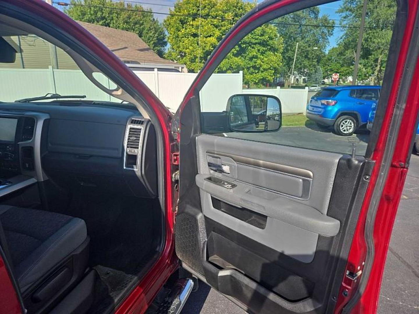 2014 RED /GREY RAM 1500 SLT Quad Cab 4WD (1C6RR7GG7ES) with an 3.6L V6 DOHC 24V FFV engine, 6-Speed Automatic transmission, located at 3304 Woodville Road, Northwood, OH, 43619, (419) 210-8019, 41.612694, -83.480743 - We are #1 Auto Loan Dealer for Good Bad or No Credit we have hundreds of vehicles to choose from, stop on in or just fill out our online application to get approved for auto financing and see your credit score for free by visiting our website today. We have Low Payment Options and Terms Available - Photo#16