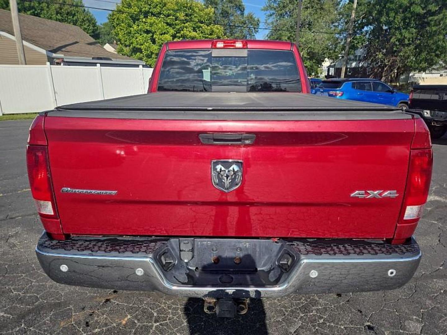 2014 RED /GREY RAM 1500 SLT Quad Cab 4WD (1C6RR7GG7ES) with an 3.6L V6 DOHC 24V FFV engine, 6-Speed Automatic transmission, located at 3304 Woodville Road, Northwood, OH, 43619, (419) 210-8019, 41.612694, -83.480743 - We are #1 Auto Loan Dealer for Good Bad or No Credit we have hundreds of vehicles to choose from, stop on in or just fill out our online application to get approved for auto financing and see your credit score for free by visiting our website today. We have Low Payment Options and Terms Available - Photo#3