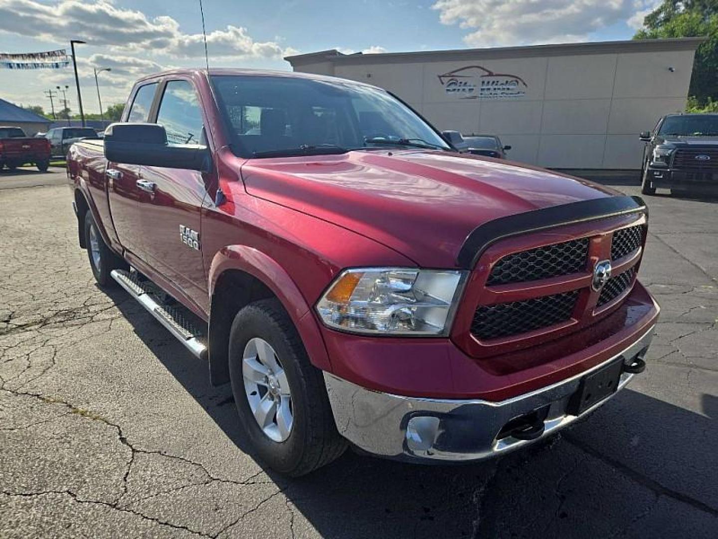 2014 RED /GREY RAM 1500 SLT Quad Cab 4WD (1C6RR7GG7ES) with an 3.6L V6 DOHC 24V FFV engine, 6-Speed Automatic transmission, located at 3304 Woodville Road, Northwood, OH, 43619, (419) 210-8019, 41.612694, -83.480743 - We are #1 Auto Loan Dealer for Good Bad or No Credit we have hundreds of vehicles to choose from, stop on in or just fill out our online application to get approved for auto financing and see your credit score for free by visiting our website today. We have Low Payment Options and Terms Available - Photo#6