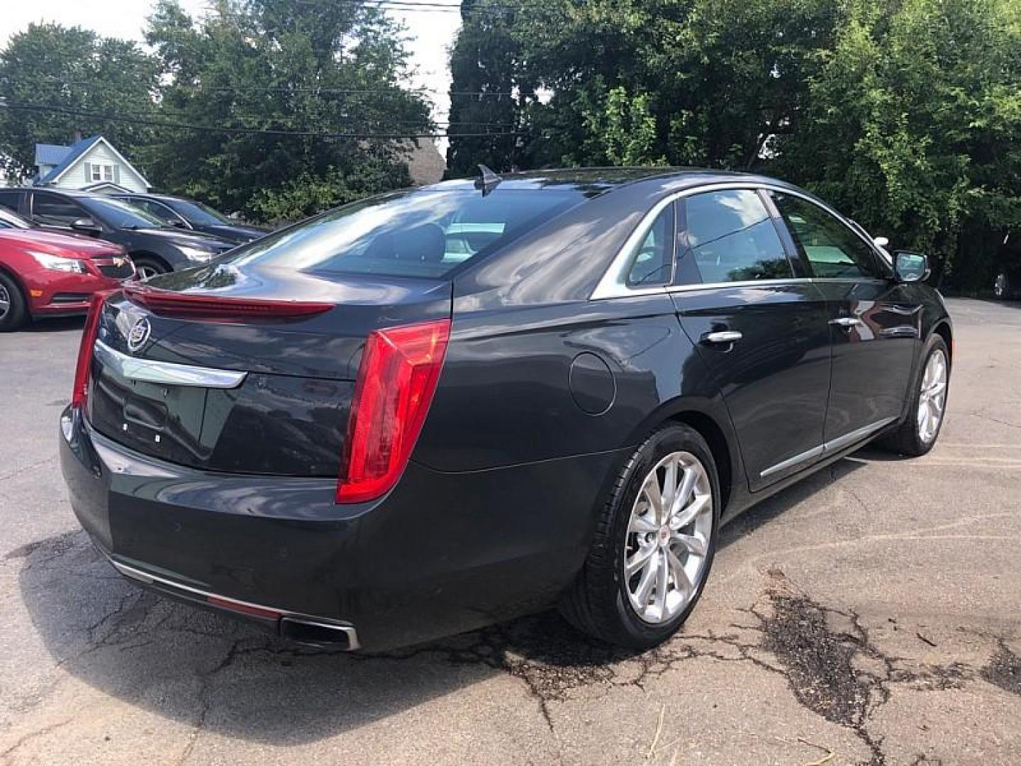 2014 Gray /TAN Cadillac XTS Premium FWD (2G61P5S34E9) with an 3.6L V6 DOHC 24V engine, 6-Speed Automatic transmission, located at 3304 Woodville Road, Northwood, OH, 43619, (419) 210-8019, 41.612694, -83.480743 - Photo#4