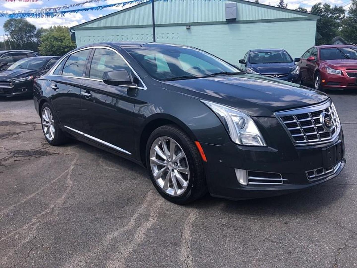 2014 Gray /TAN Cadillac XTS Premium FWD (2G61P5S34E9) with an 3.6L V6 DOHC 24V engine, 6-Speed Automatic transmission, located at 3304 Woodville Road, Northwood, OH, 43619, (419) 210-8019, 41.612694, -83.480743 - Photo#6